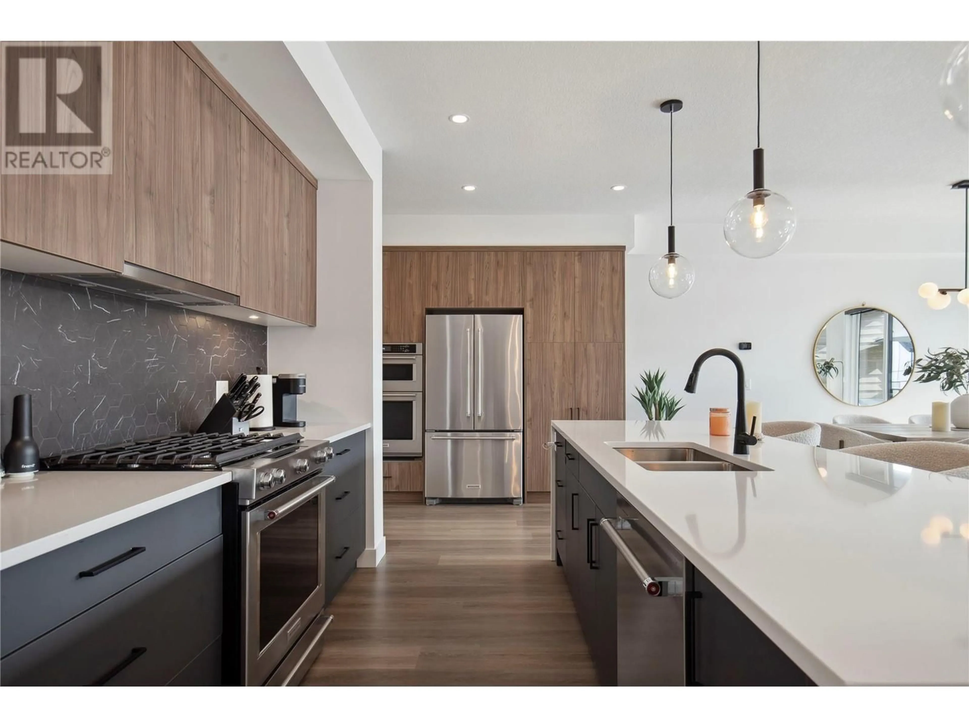 Open concept kitchen, wood/laminate floor for 502 - 2735 SHANNON LAKE ROAD, West Kelowna British Columbia V4T1V6