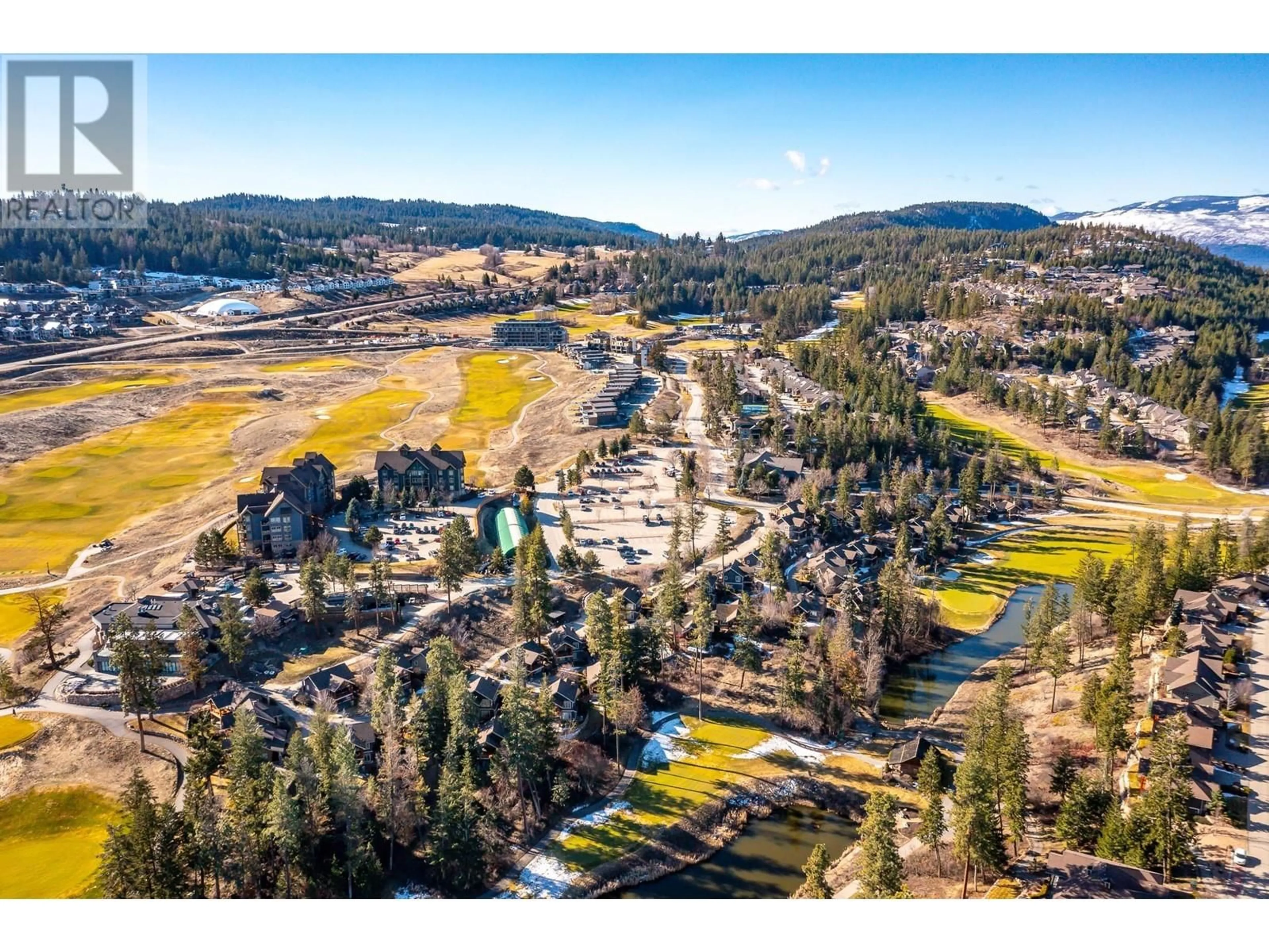 A pic from outside/outdoor area/front of a property/back of a property/a pic from drone, mountain view for 126 - 105 VILLAGE CENTRE COURT, Vernon British Columbia V1H1Y8