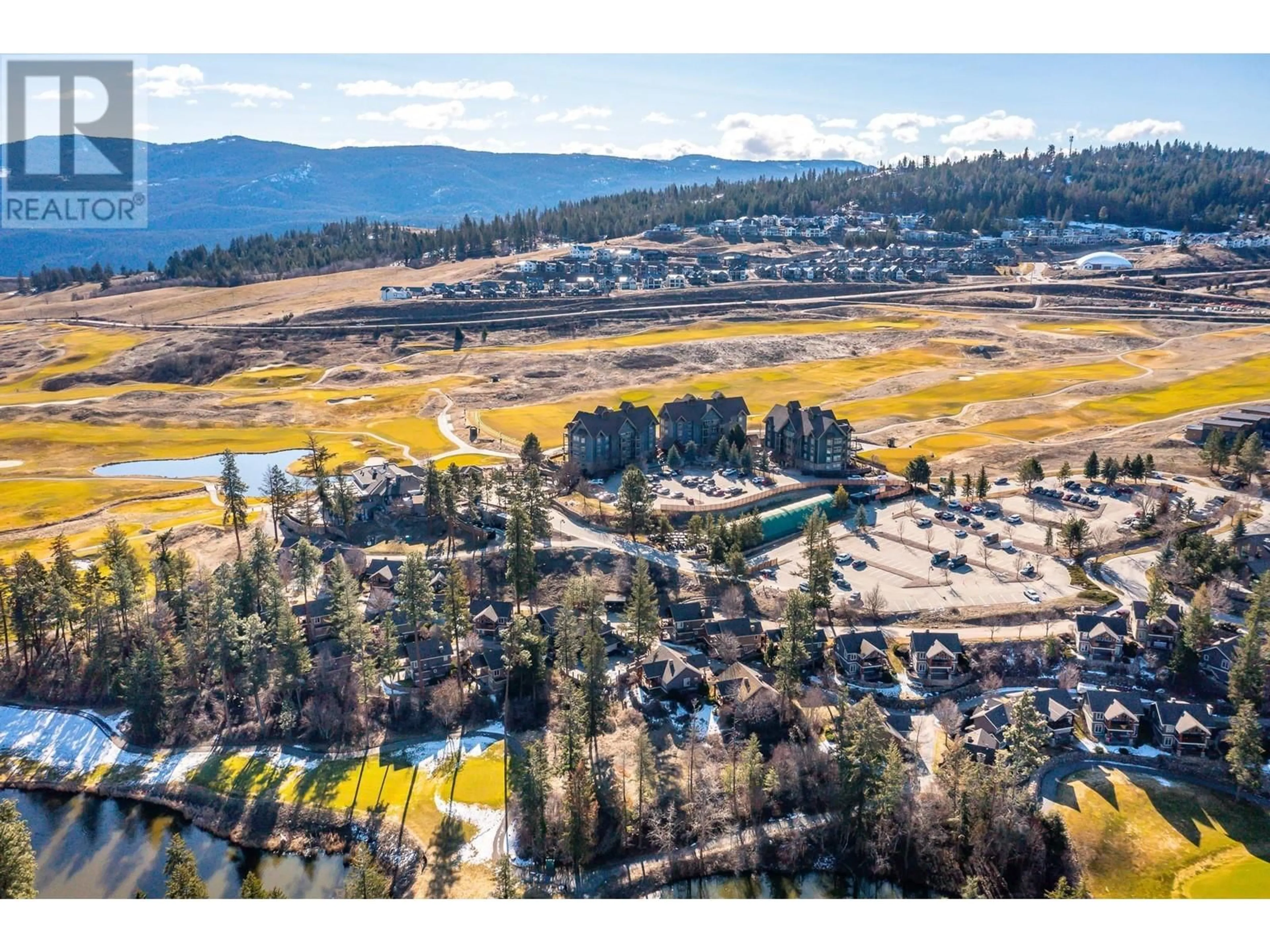 A pic from outside/outdoor area/front of a property/back of a property/a pic from drone, mountain view for 126 - 105 VILLAGE CENTRE COURT, Vernon British Columbia V1H1Y8