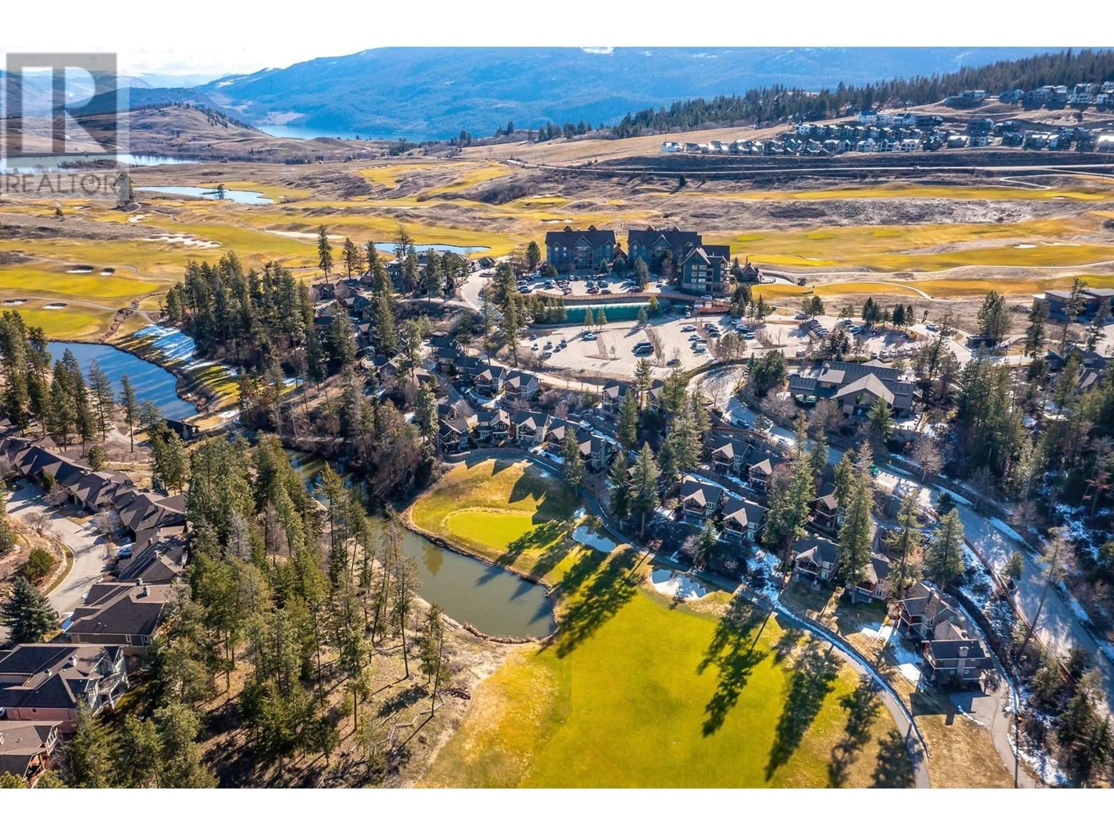 A pic from outside/outdoor area/front of a property/back of a property/a pic from drone, mountain view for 126 - 105 VILLAGE CENTRE COURT, Vernon British Columbia V1H1Y8