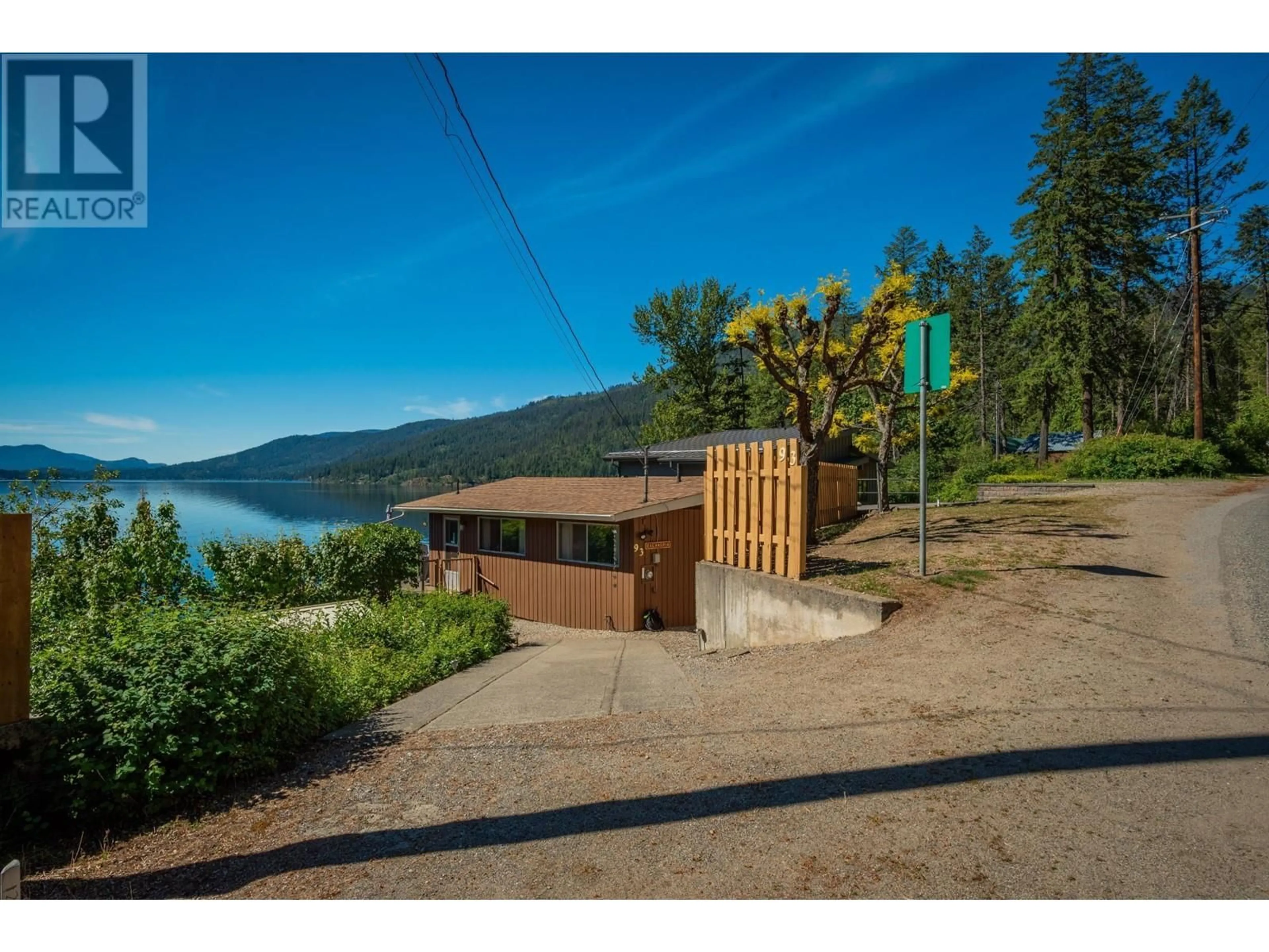 A pic from outside/outdoor area/front of a property/back of a property/a pic from drone, water/lake/river/ocean view for 93 EAST LAKE DRIVE, Christina Lake British Columbia V0H1E1