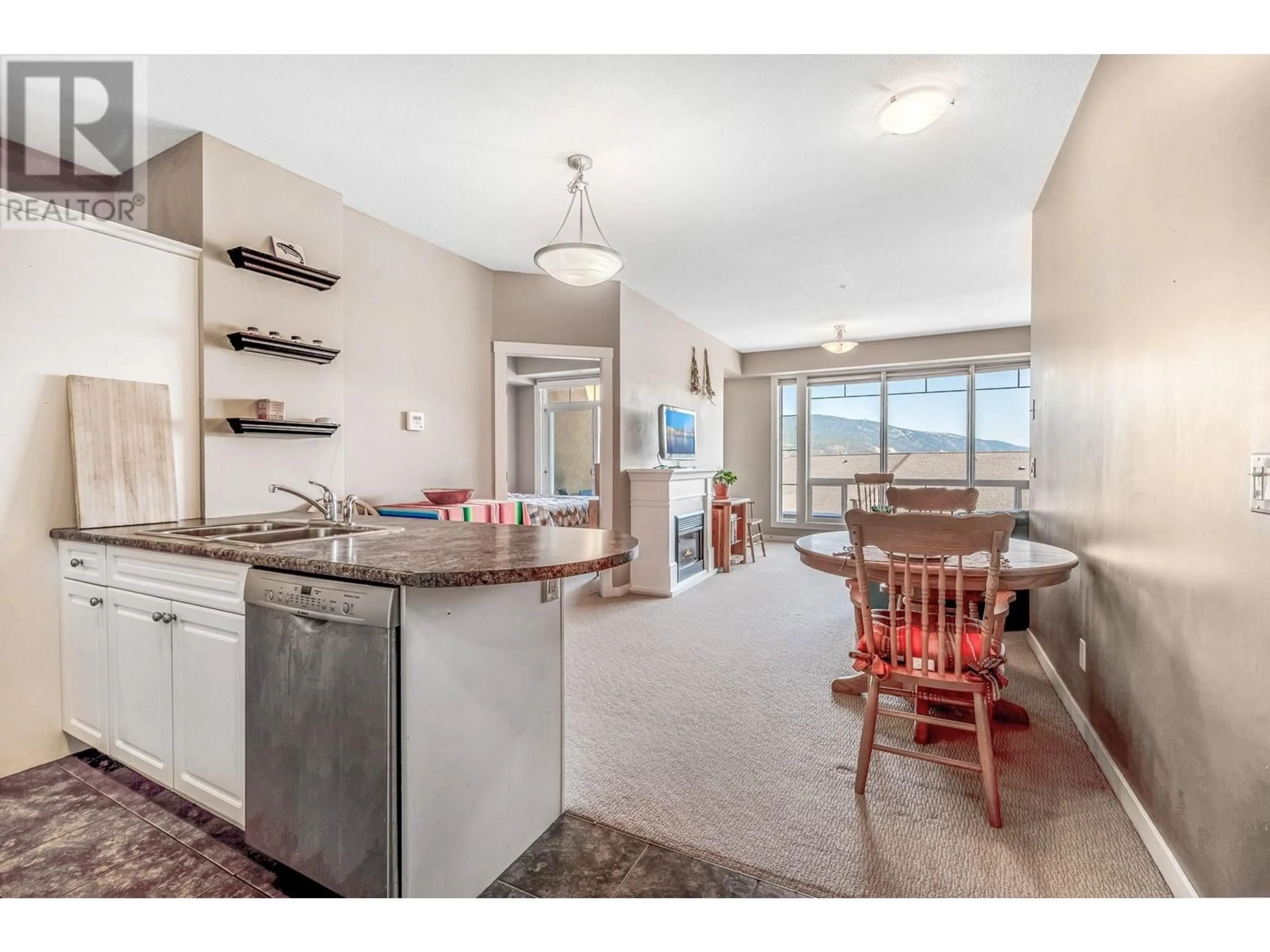 Open concept kitchen, unknown for 413 - 3550 WOODSDALE ROAD, Lake Country British Columbia V4V1Y9