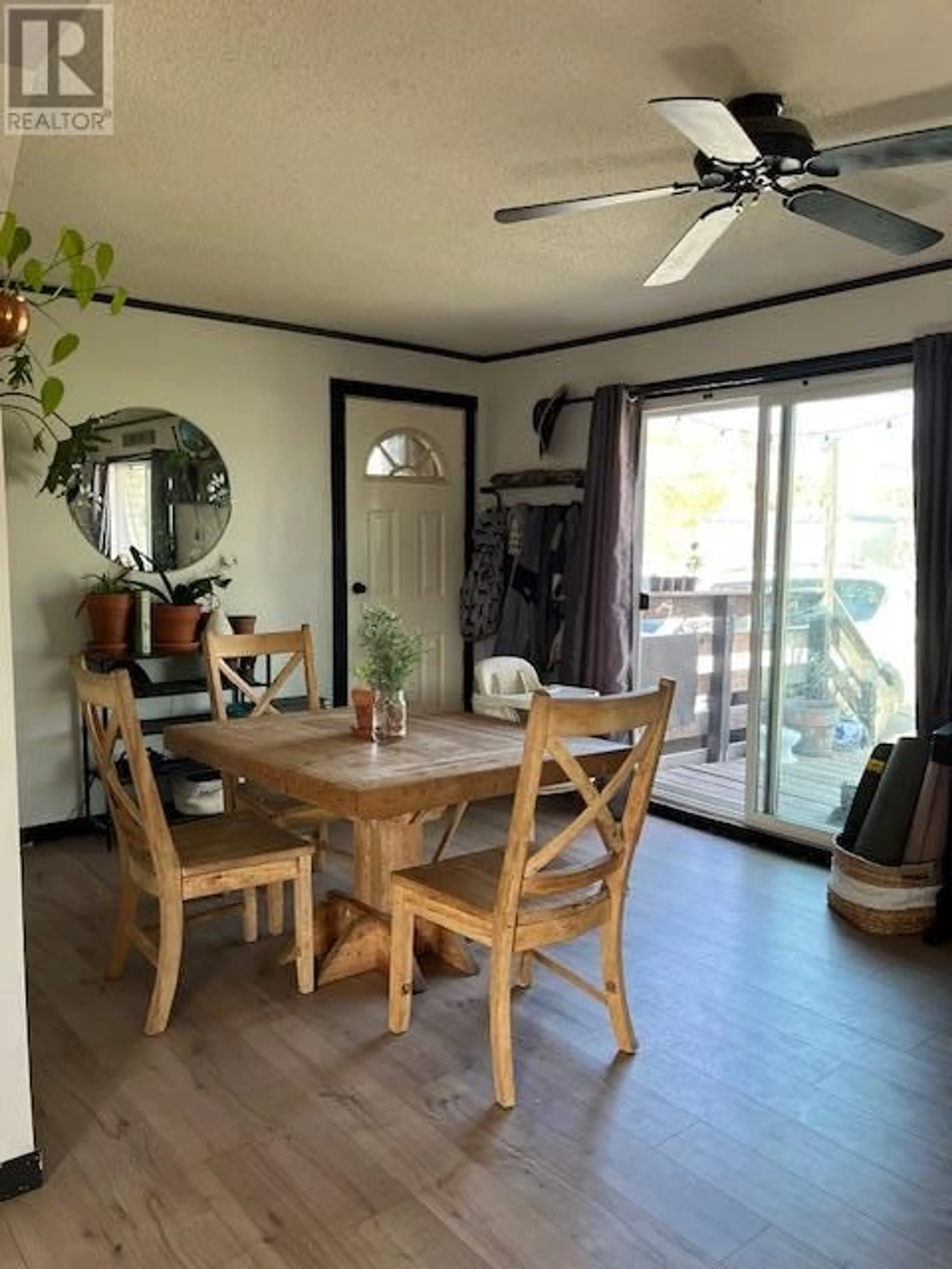 Dining room, wood/laminate floor for 9704 JULIA STREET, Summerland British Columbia V0H1Z5