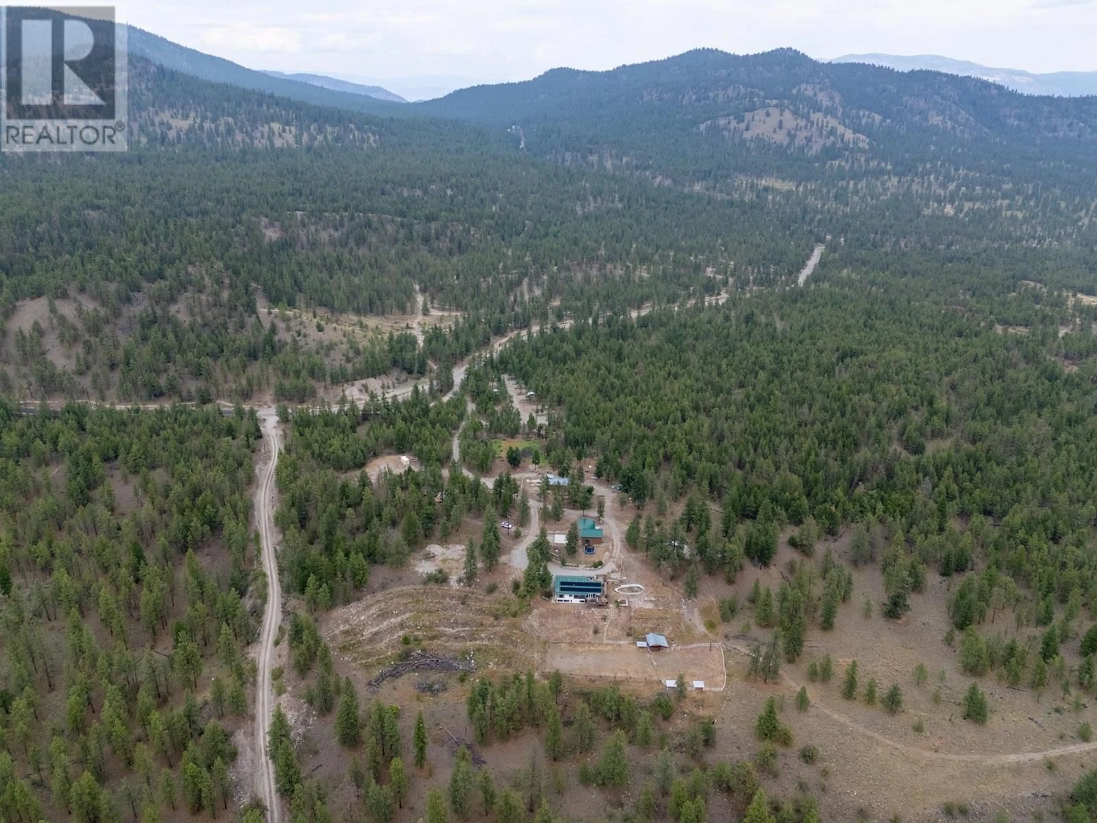 A pic from outside/outdoor area/front of a property/back of a property/a pic from drone, mountain view for 20201 HIGHWAY 40 OTHER, Summerland British Columbia V0H1Z8