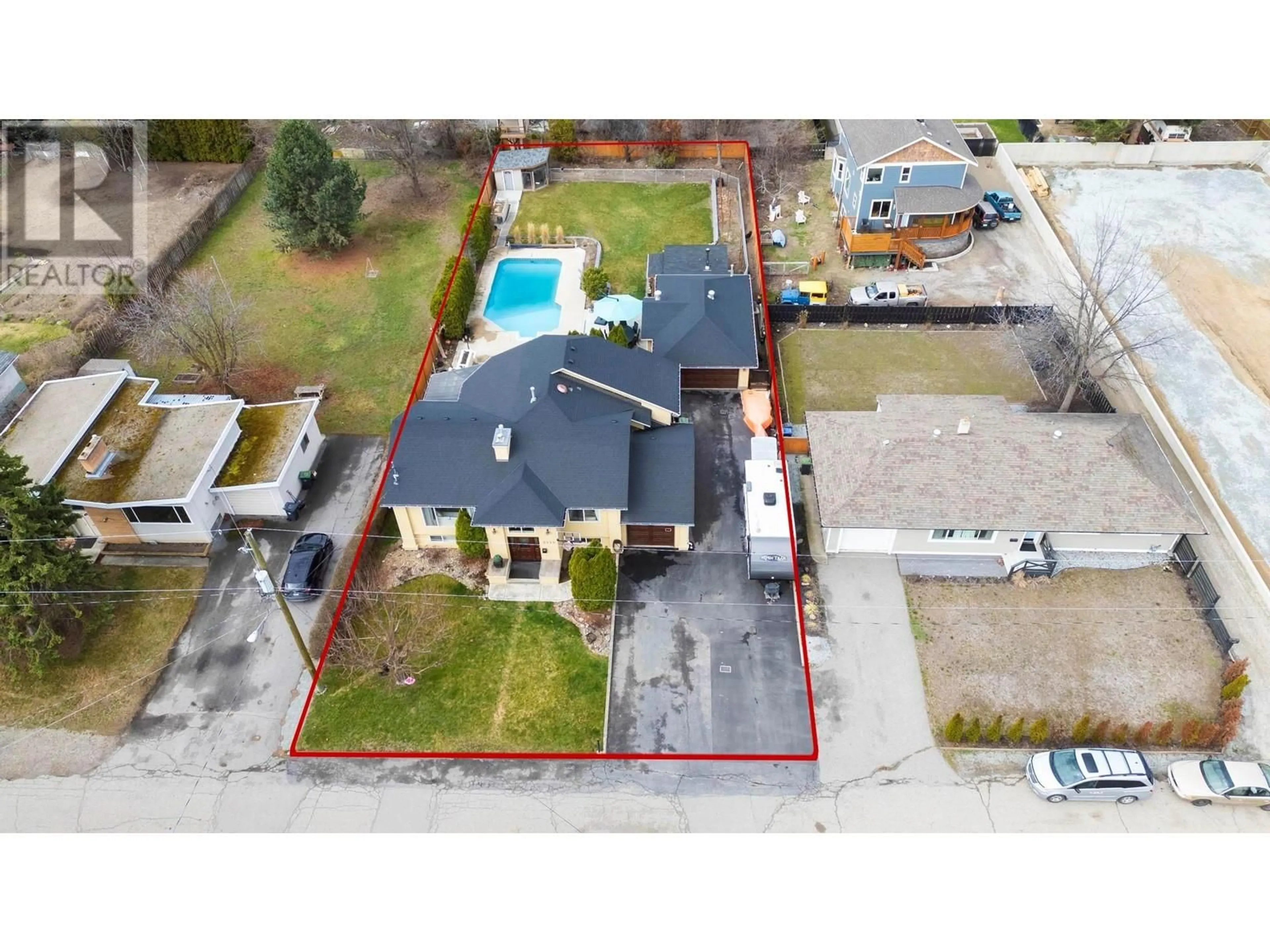 A pic from outside/outdoor area/front of a property/back of a property/a pic from drone, street for 3050 HOLLAND ROAD, Kelowna British Columbia V1W3P8
