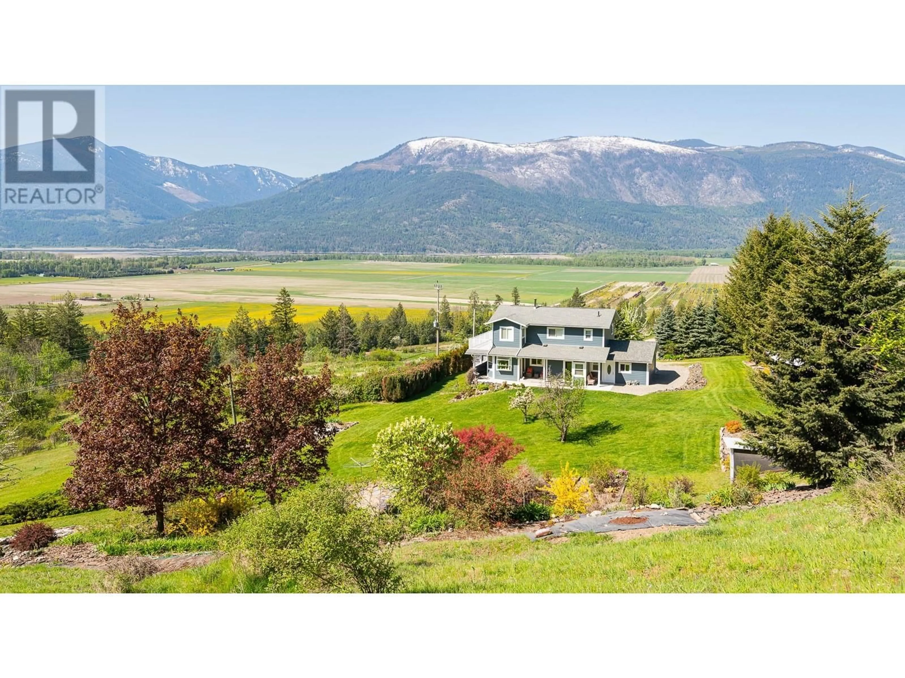 A pic from outside/outdoor area/front of a property/back of a property/a pic from drone, mountain view for 5650 BATHIE ROAD, Wynndel British Columbia V0B2N2