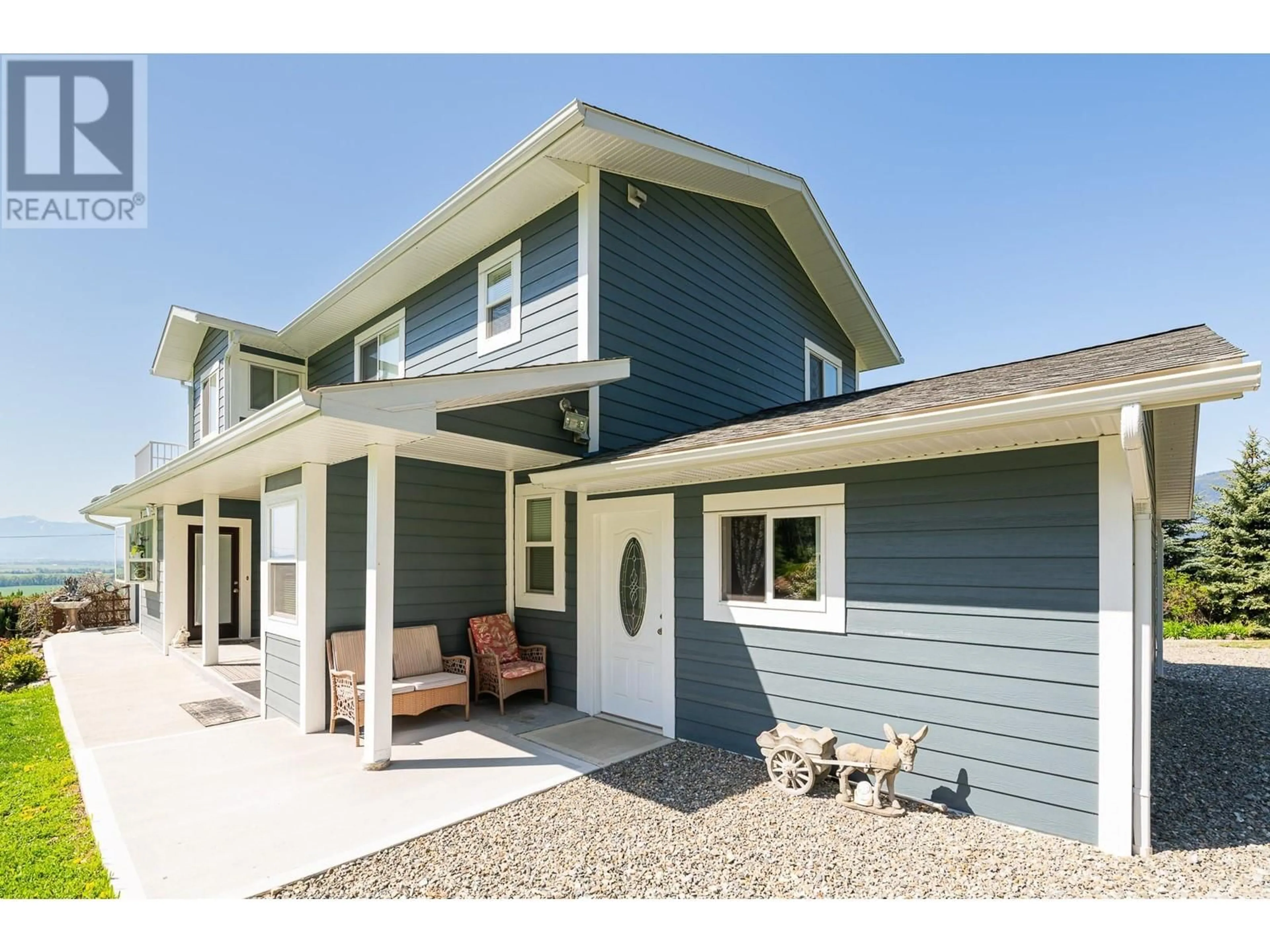 Home with vinyl exterior material, street for 5650 BATHIE ROAD, Wynndel British Columbia V0B2N2