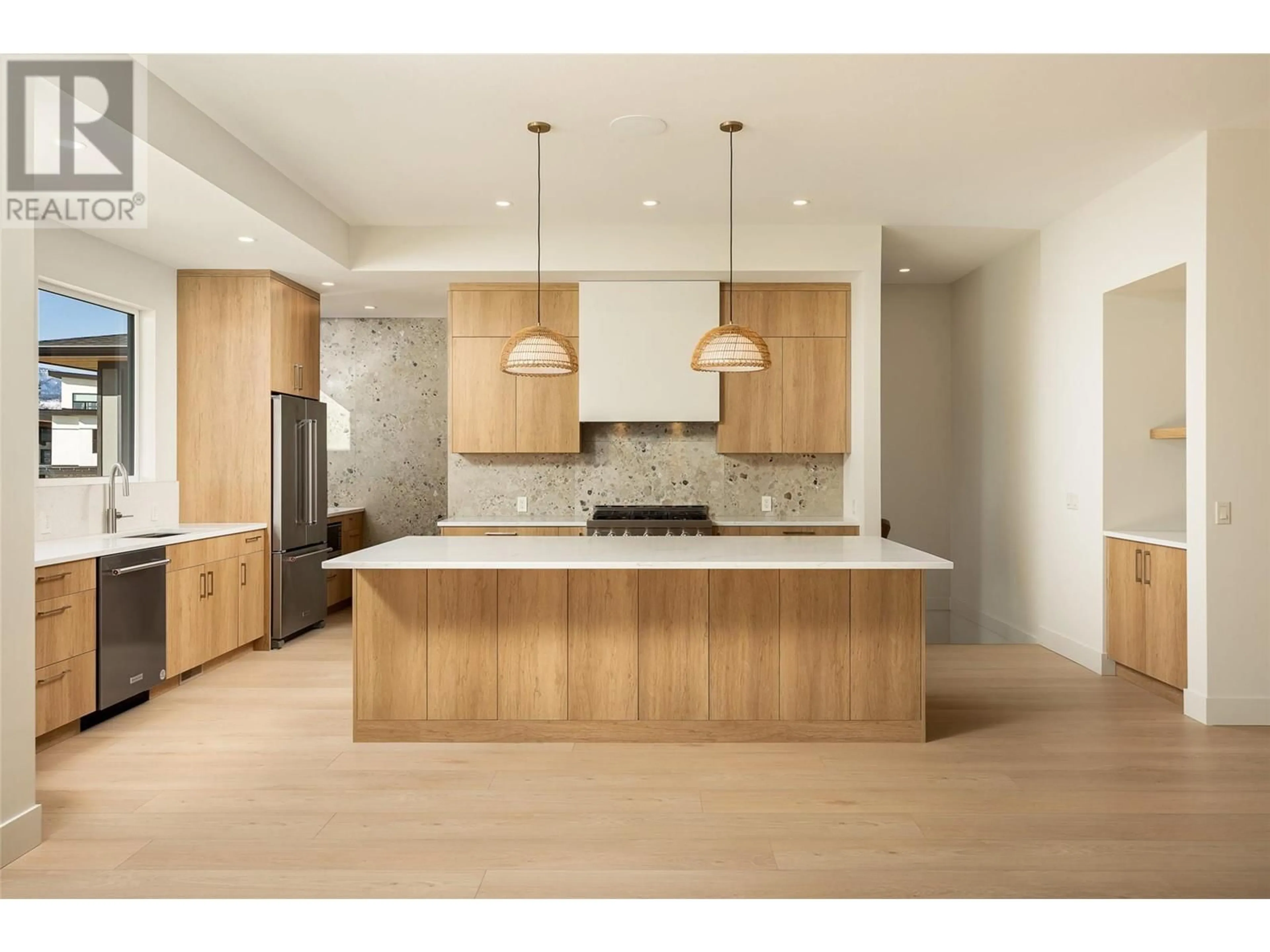 Open concept kitchen, wood/laminate floor for 9489 LEDGESTONE ROAD, Lake Country British Columbia V4V0A4