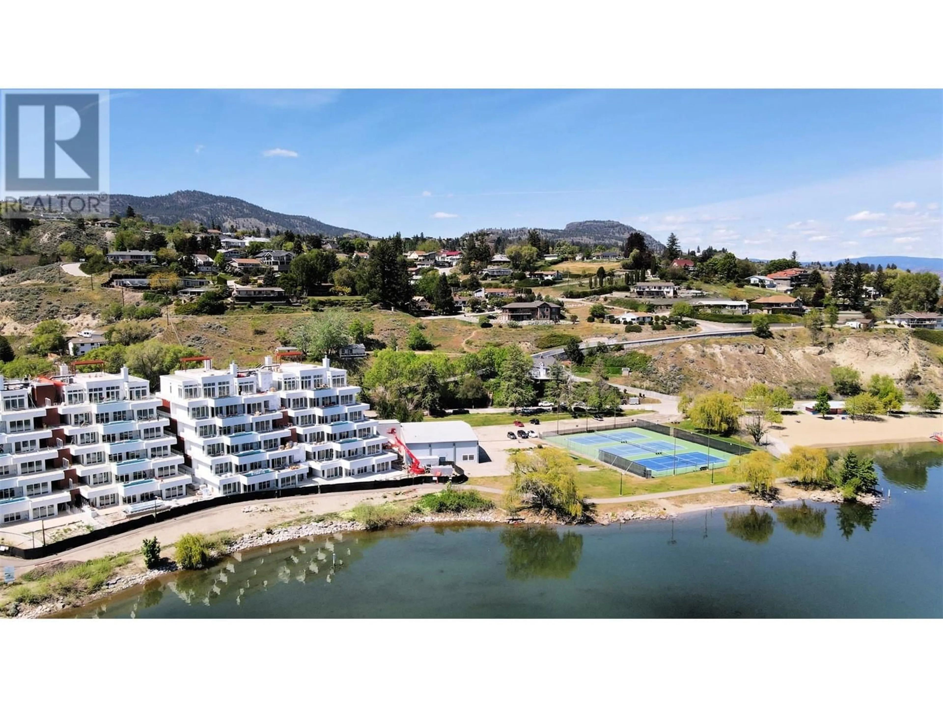 A pic from outside/outdoor area/front of a property/back of a property/a pic from drone, water/lake/river/ocean view for 204 - 13415 LAKESHORE DRIVE, Summerland British Columbia V0H1Z1