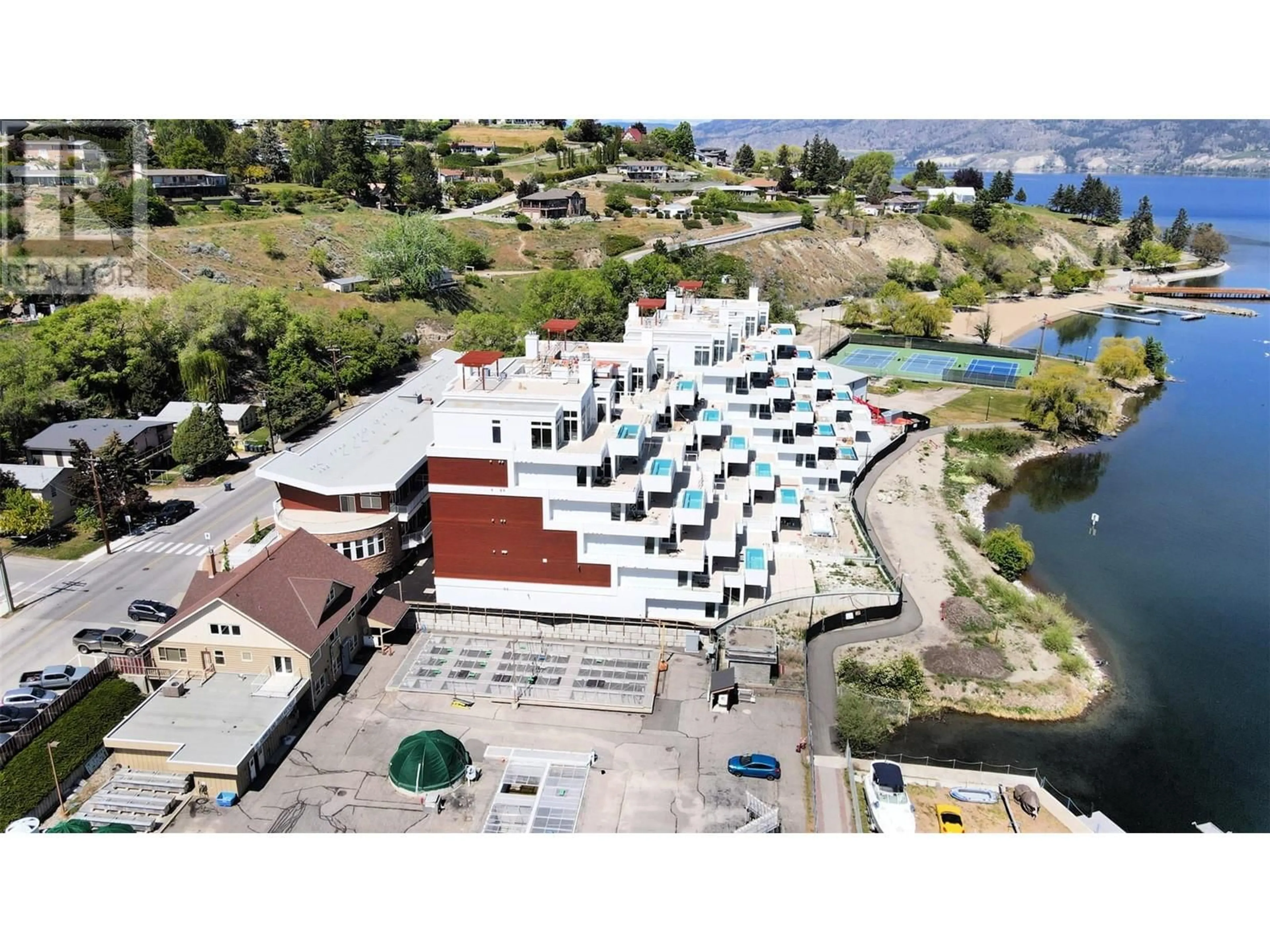 A pic from outside/outdoor area/front of a property/back of a property/a pic from drone, unknown for 204 - 13415 LAKESHORE DRIVE, Summerland British Columbia V0H1Z1