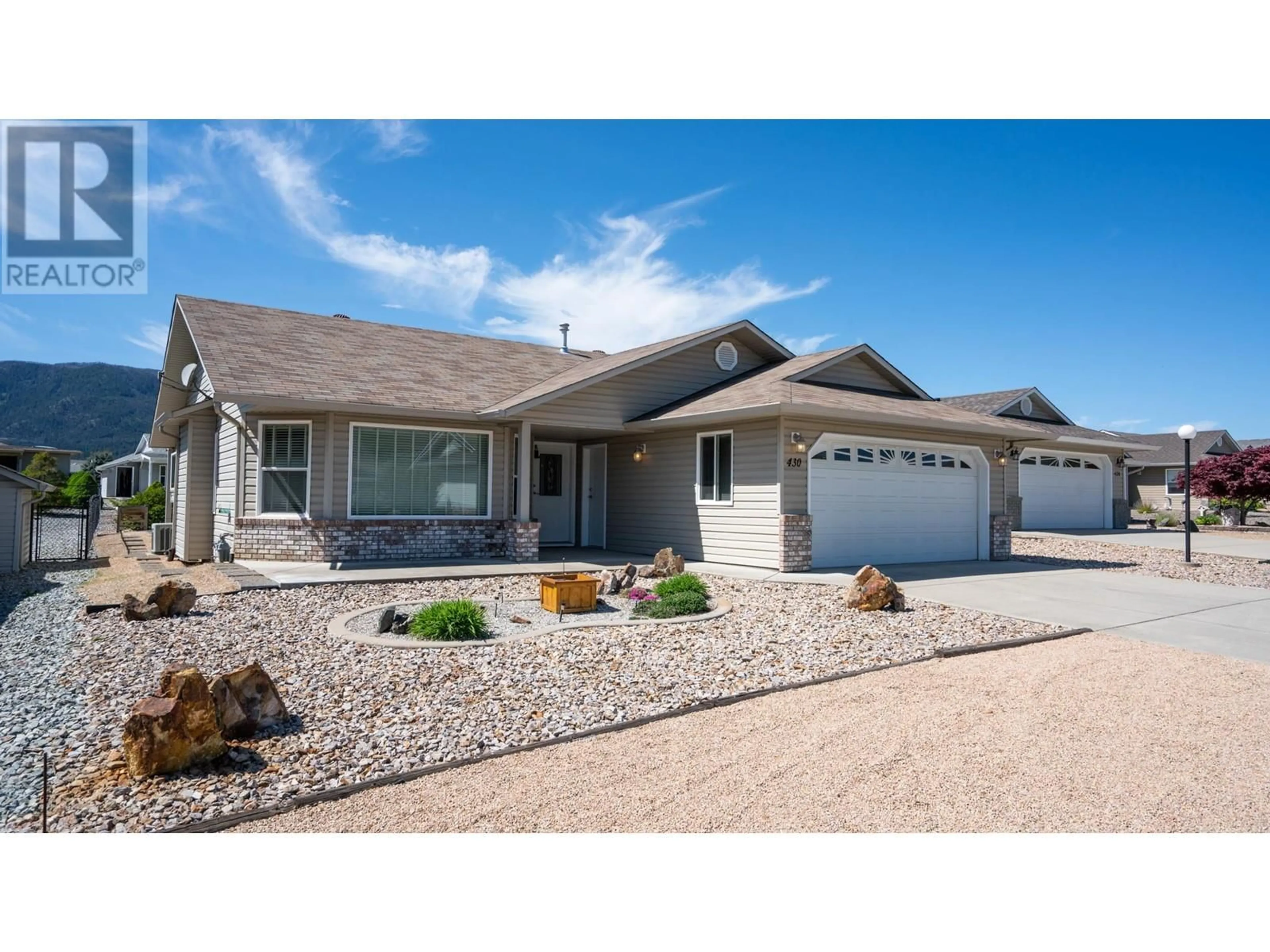 Home with vinyl exterior material, street for 430 4 STREET, Vernon British Columbia V1H1Z1