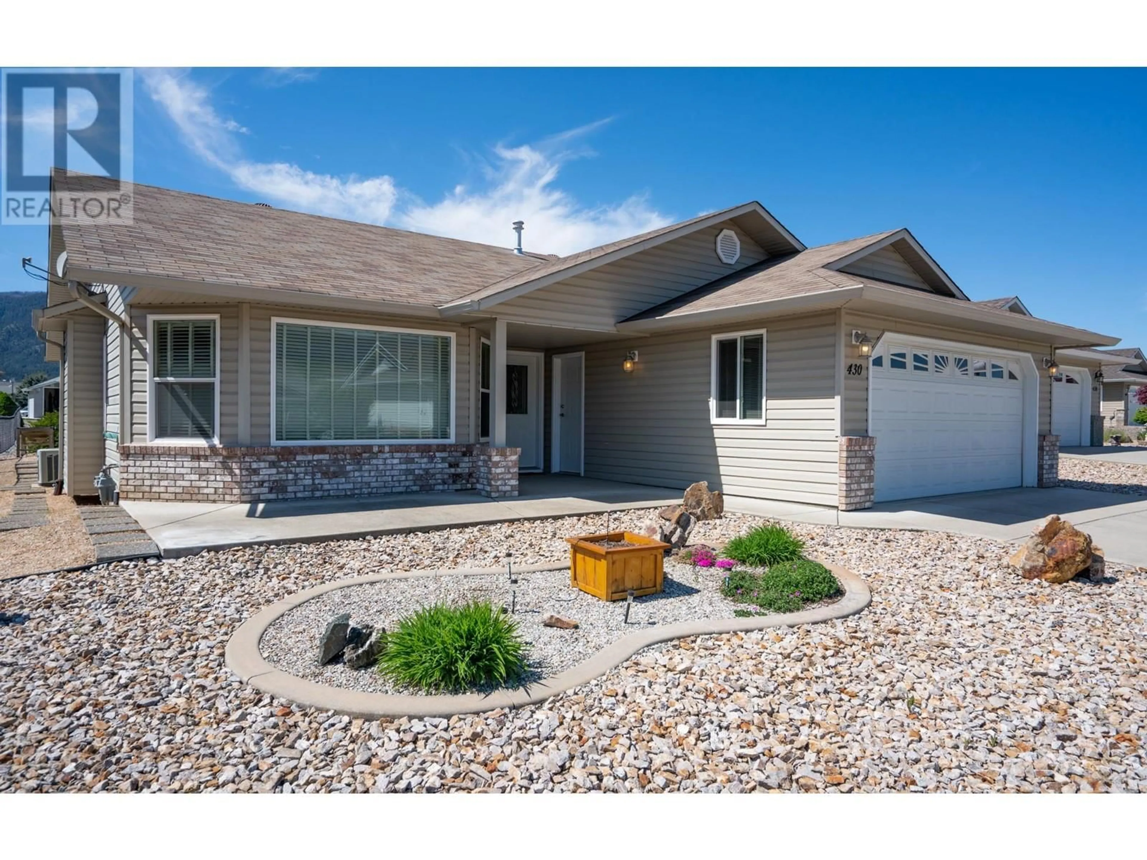 Home with vinyl exterior material, street for 430 4 STREET, Vernon British Columbia V1H1Z1