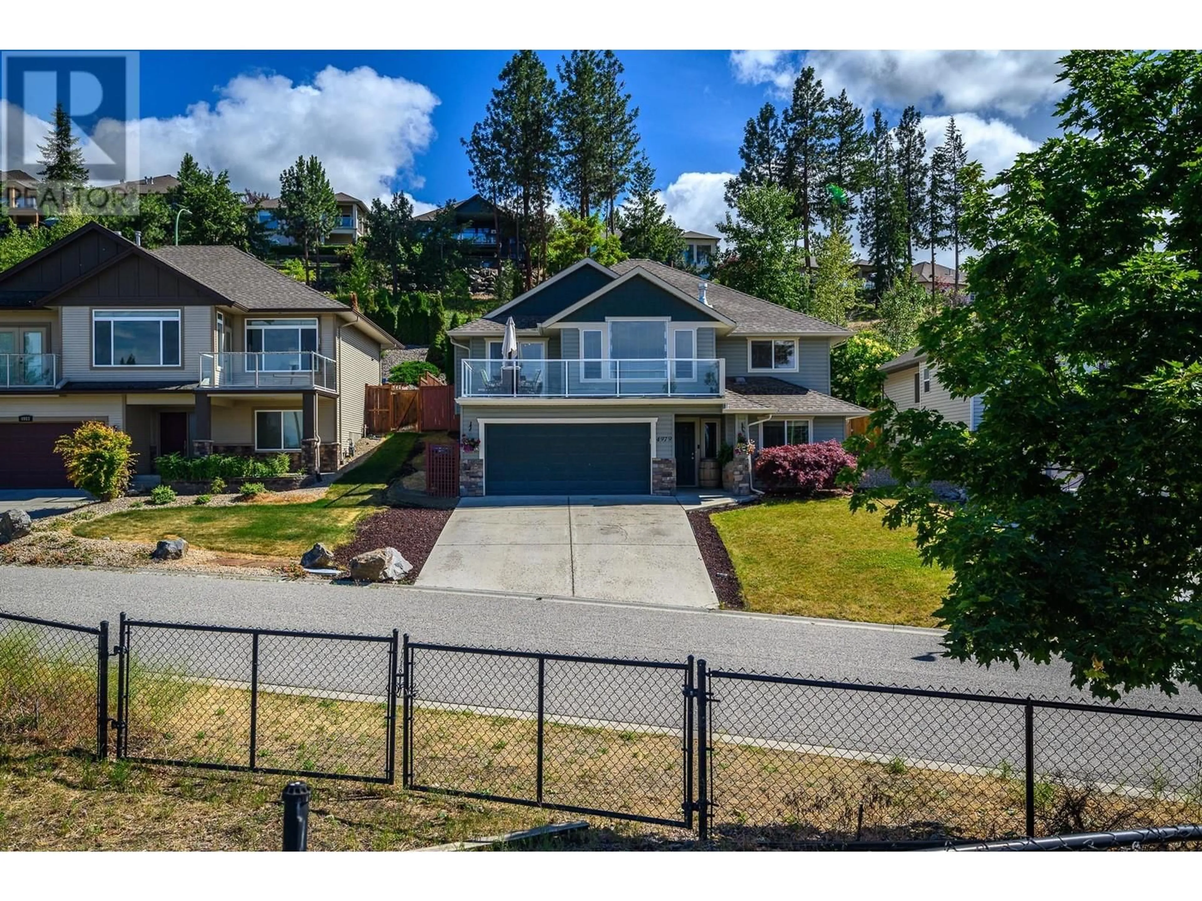A pic from outside/outdoor area/front of a property/back of a property/a pic from drone, water/lake/river/ocean view for 4979 WINDSONG CRESCENT, Kelowna British Columbia V1W5C4