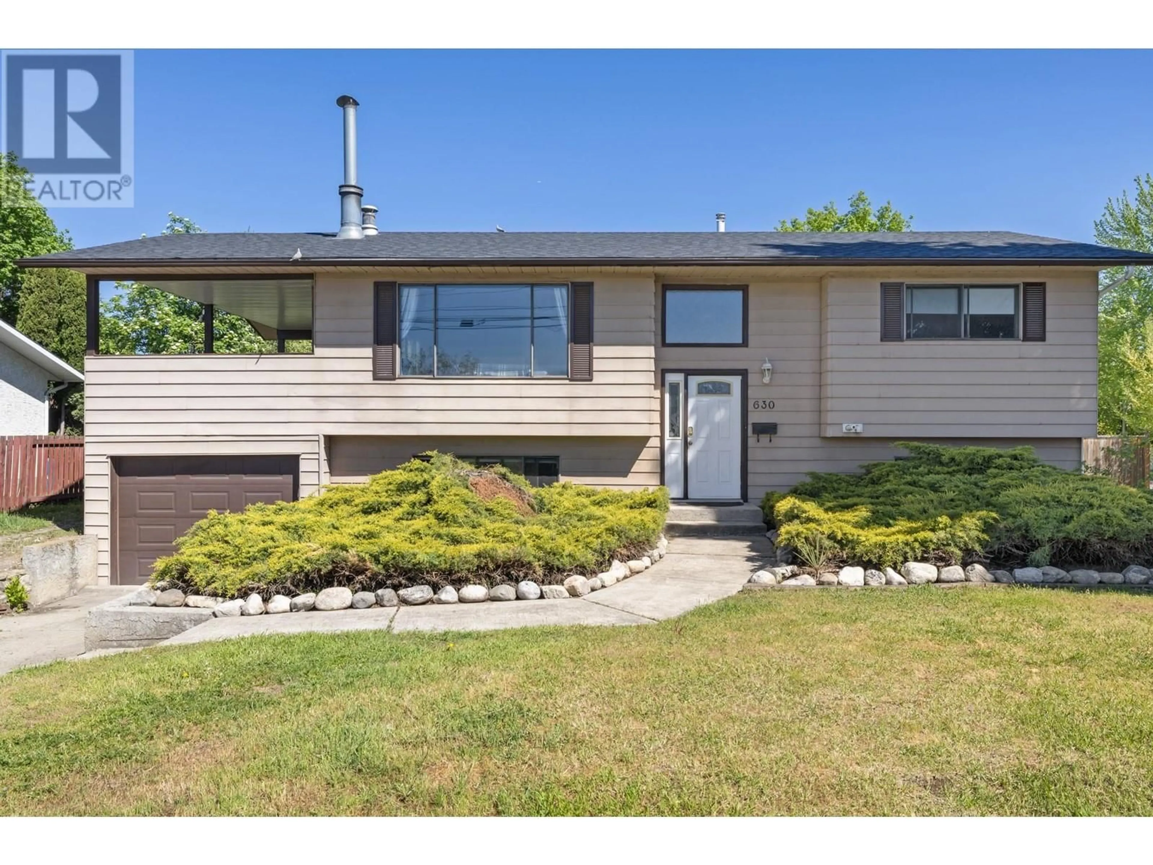 Home with vinyl exterior material, street for 630 LEATHEAD ROAD, Kelowna British Columbia V1X2J6