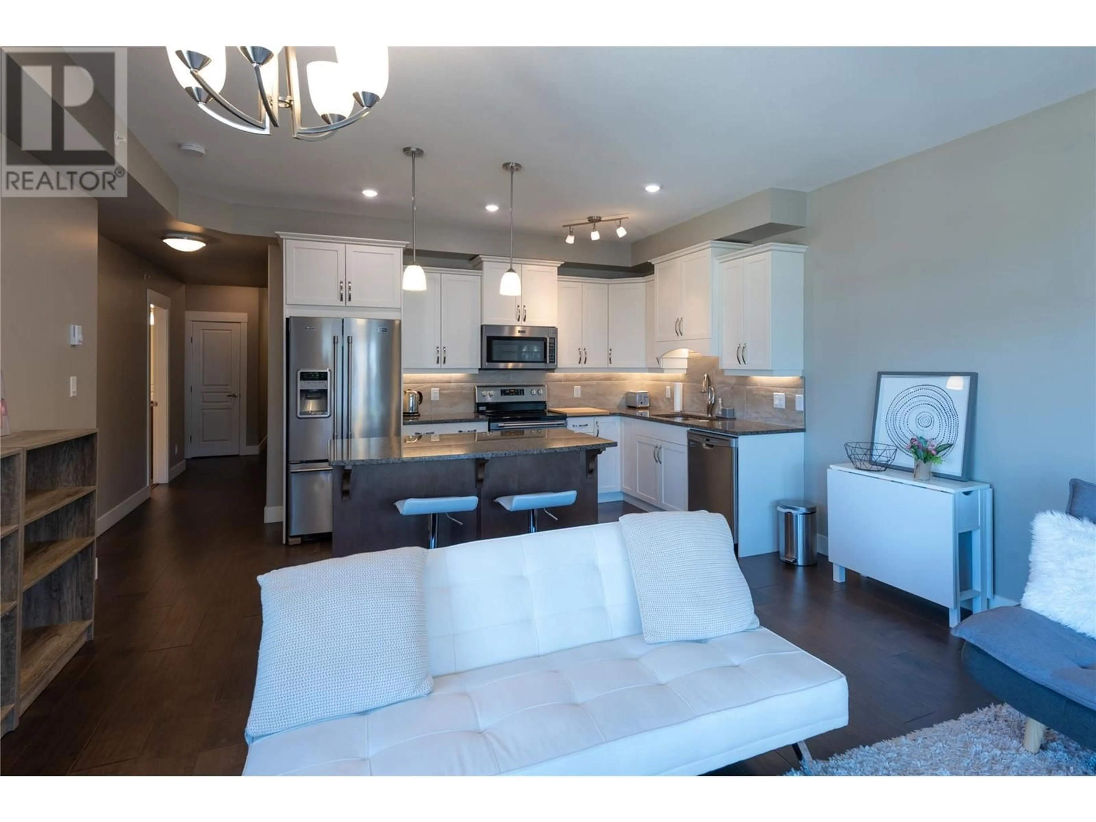 Open concept kitchen, wood/laminate floor for 607 - 765 MCGILL ROAD, Kamloops British Columbia V2C0B7