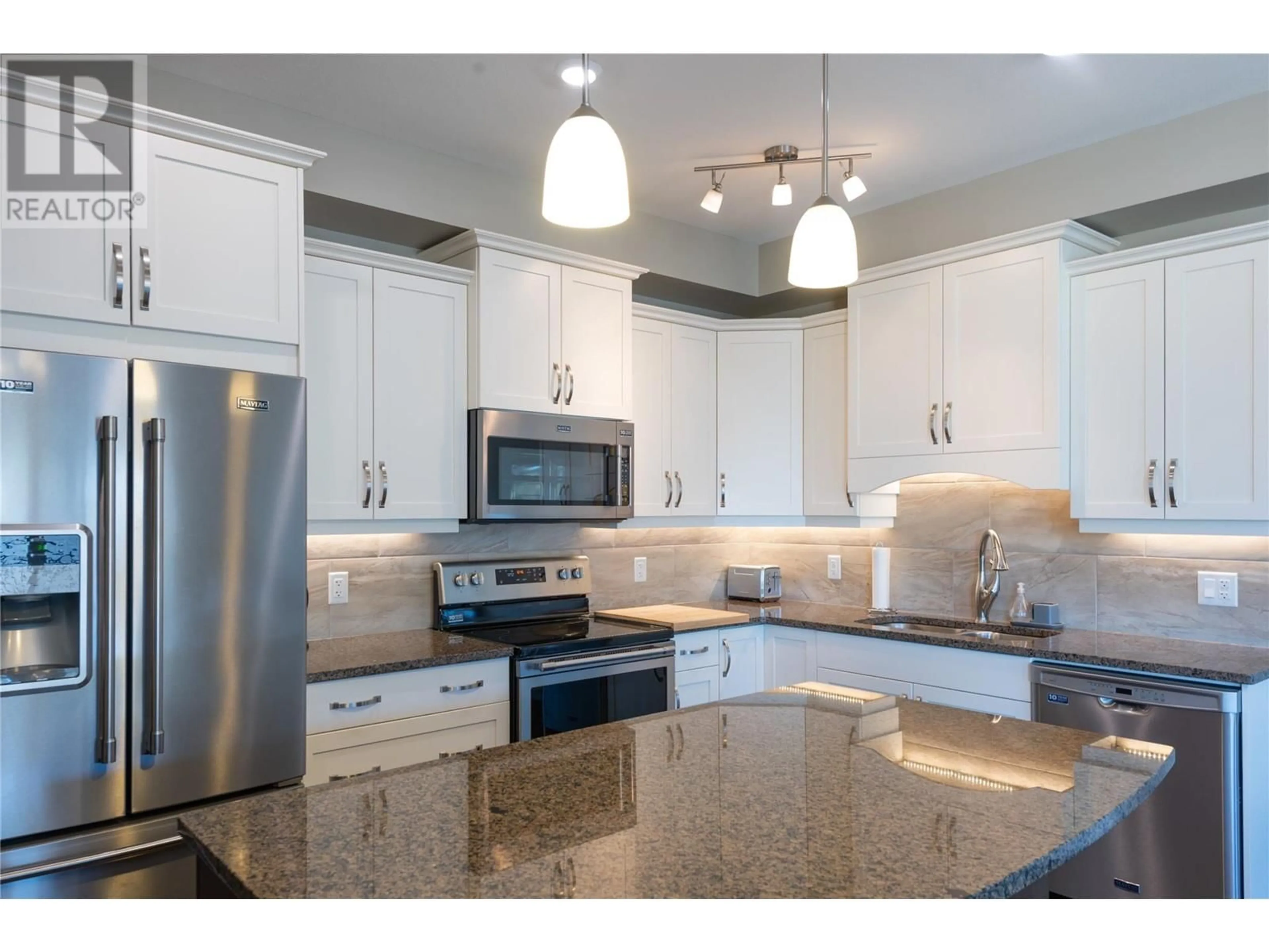 Open concept kitchen, ceramic/tile floor for 607 - 765 MCGILL ROAD, Kamloops British Columbia V2C0B7