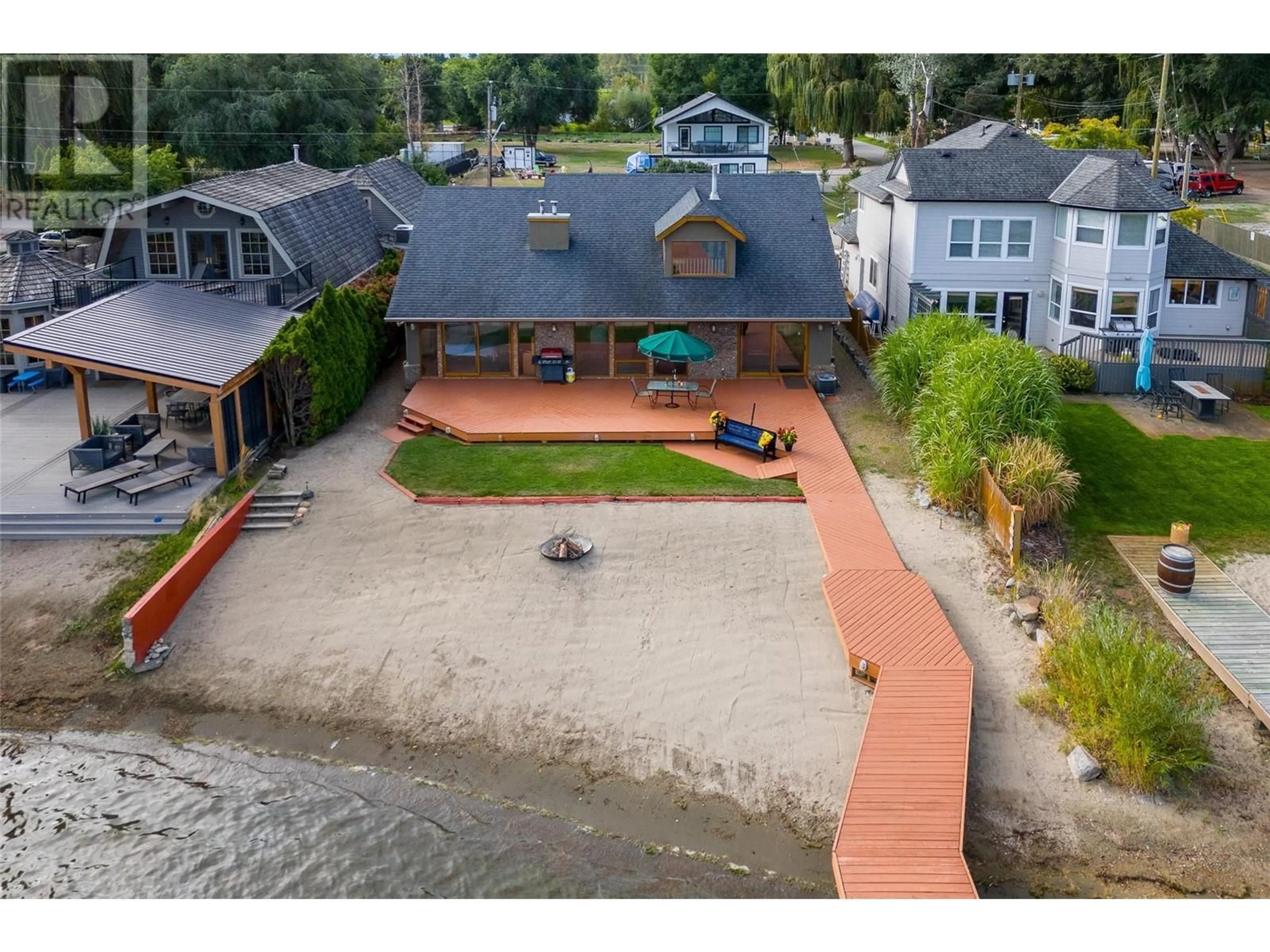 A pic from outside/outdoor area/front of a property/back of a property/a pic from drone, water/lake/river/ocean view for 11620 SEYMOUR ROAD, Lake Country British Columbia V4V1X9