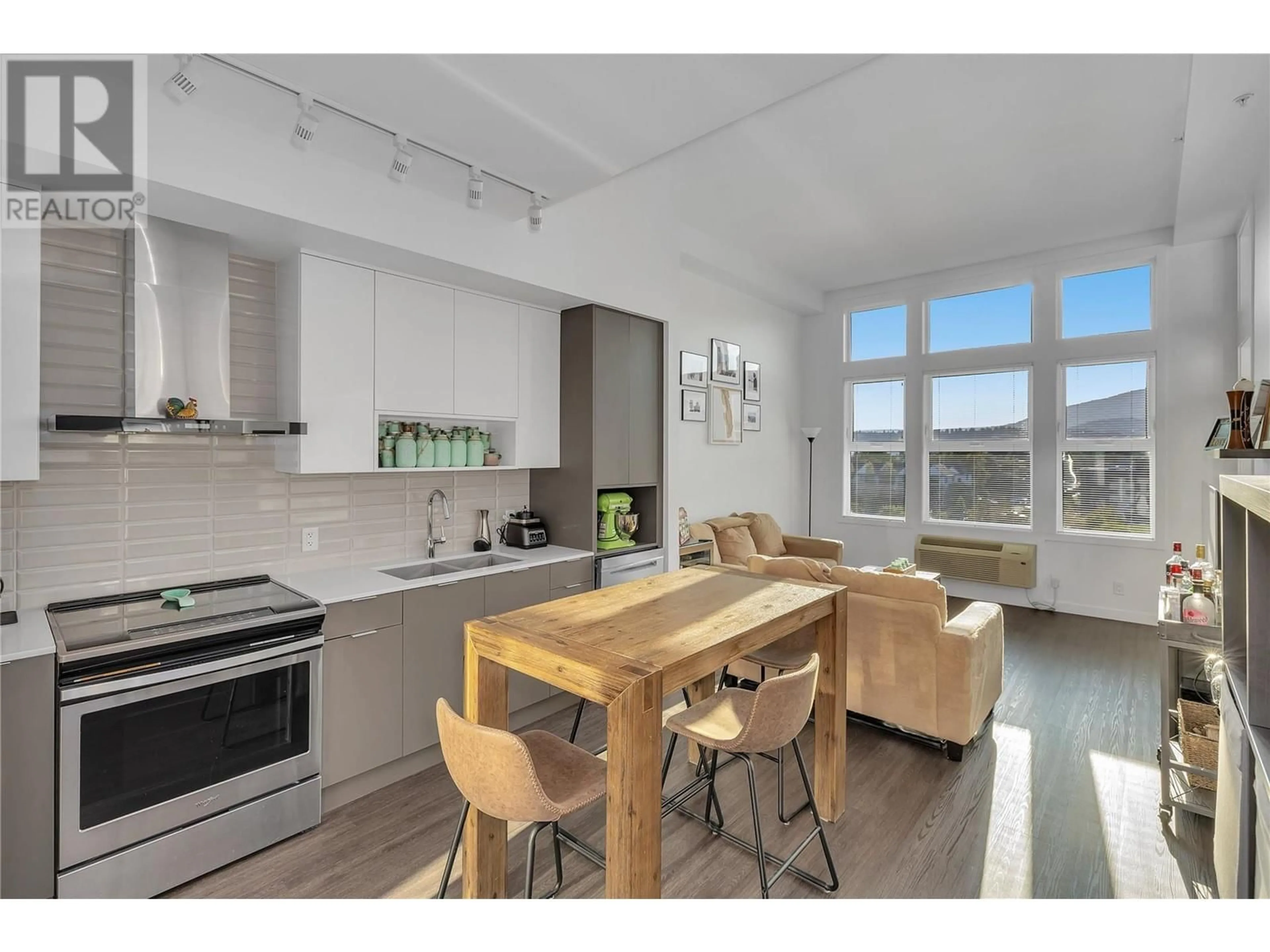 Open concept kitchen, wood/laminate floor for PH12 - 1800 RICHTER STREET, Kelowna British Columbia V1Y0G9