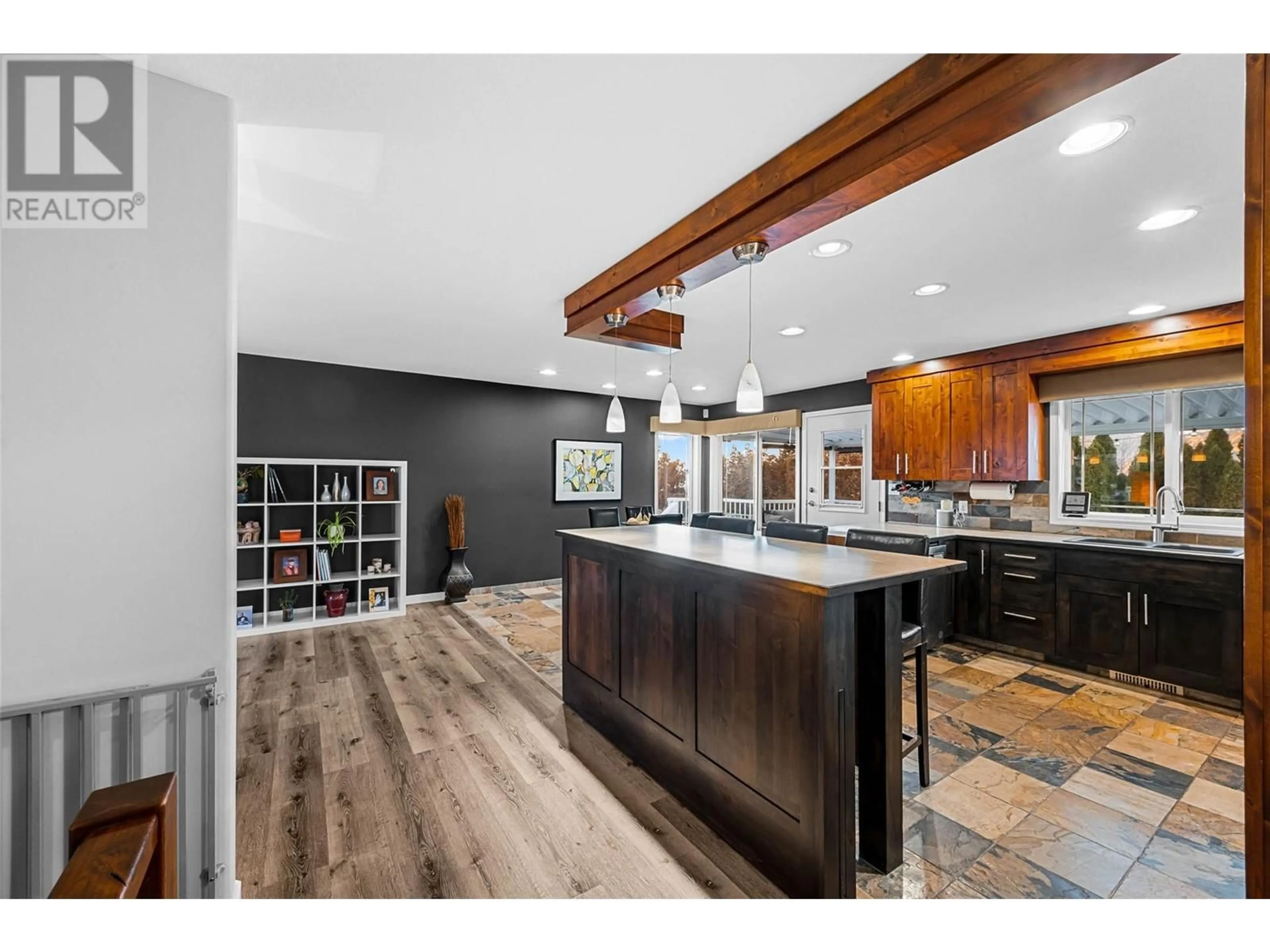 Open concept kitchen, wood/laminate floor for 2506 NECHAKO DRIVE, Kamloops British Columbia V2E2C9