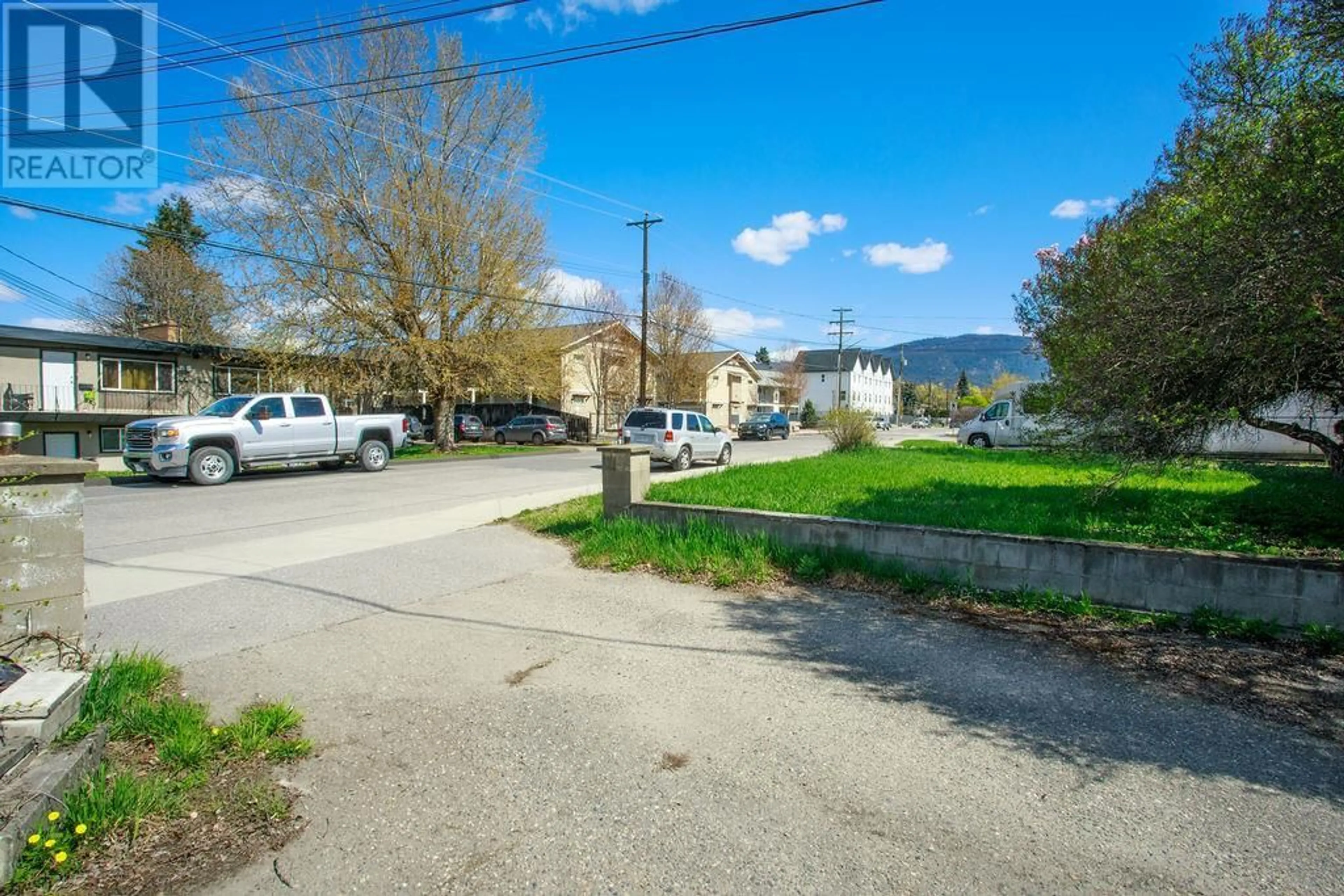 A pic from outside/outdoor area/front of a property/back of a property/a pic from drone, street for 3706 24 AVENUE, Vernon British Columbia V1T1L9