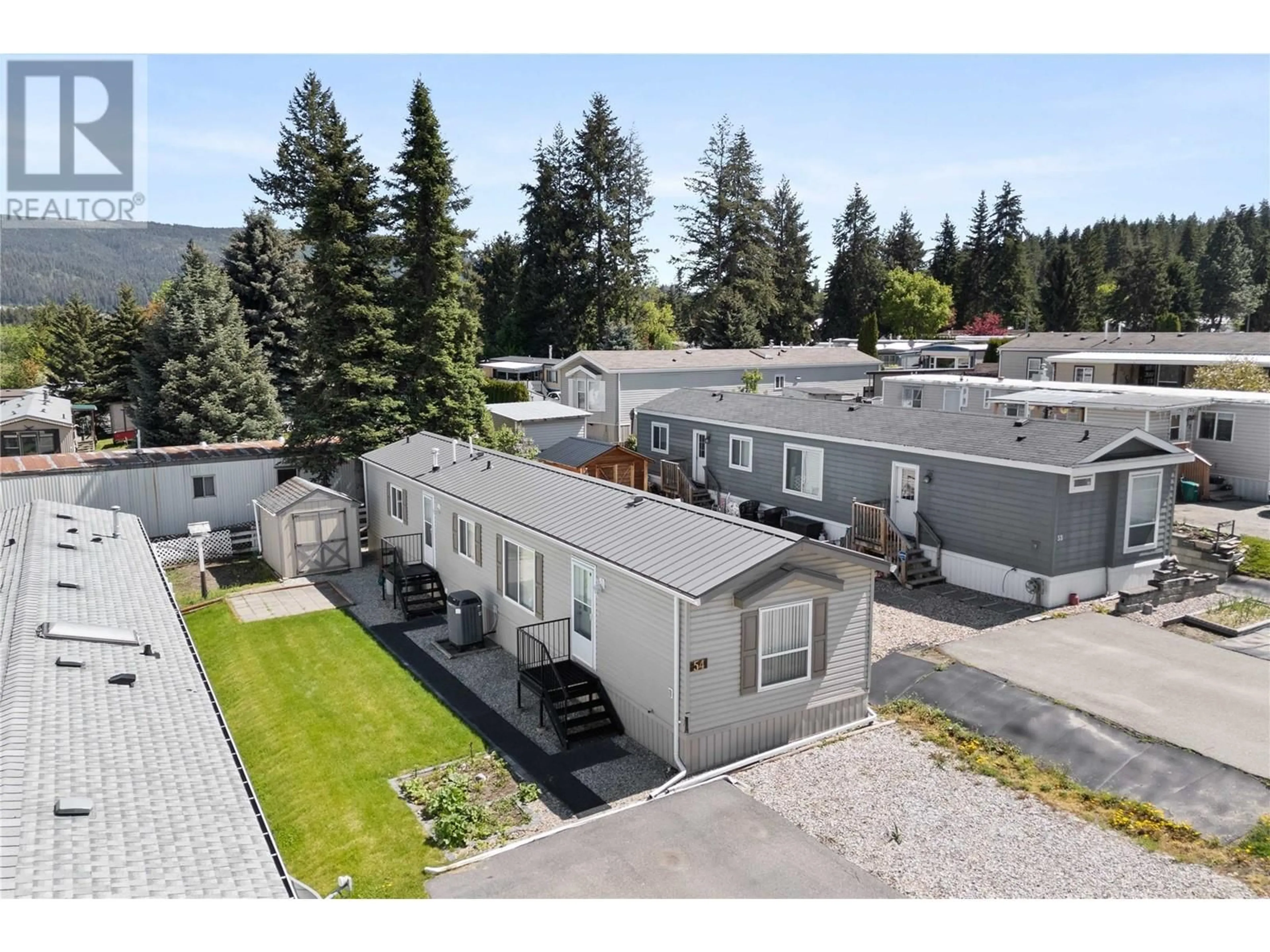 A pic from outside/outdoor area/front of a property/back of a property/a pic from drone, mountain view for 54 - 3350 10TH AVENUE NORTHEAST, Salmon Arm British Columbia V1E1J6