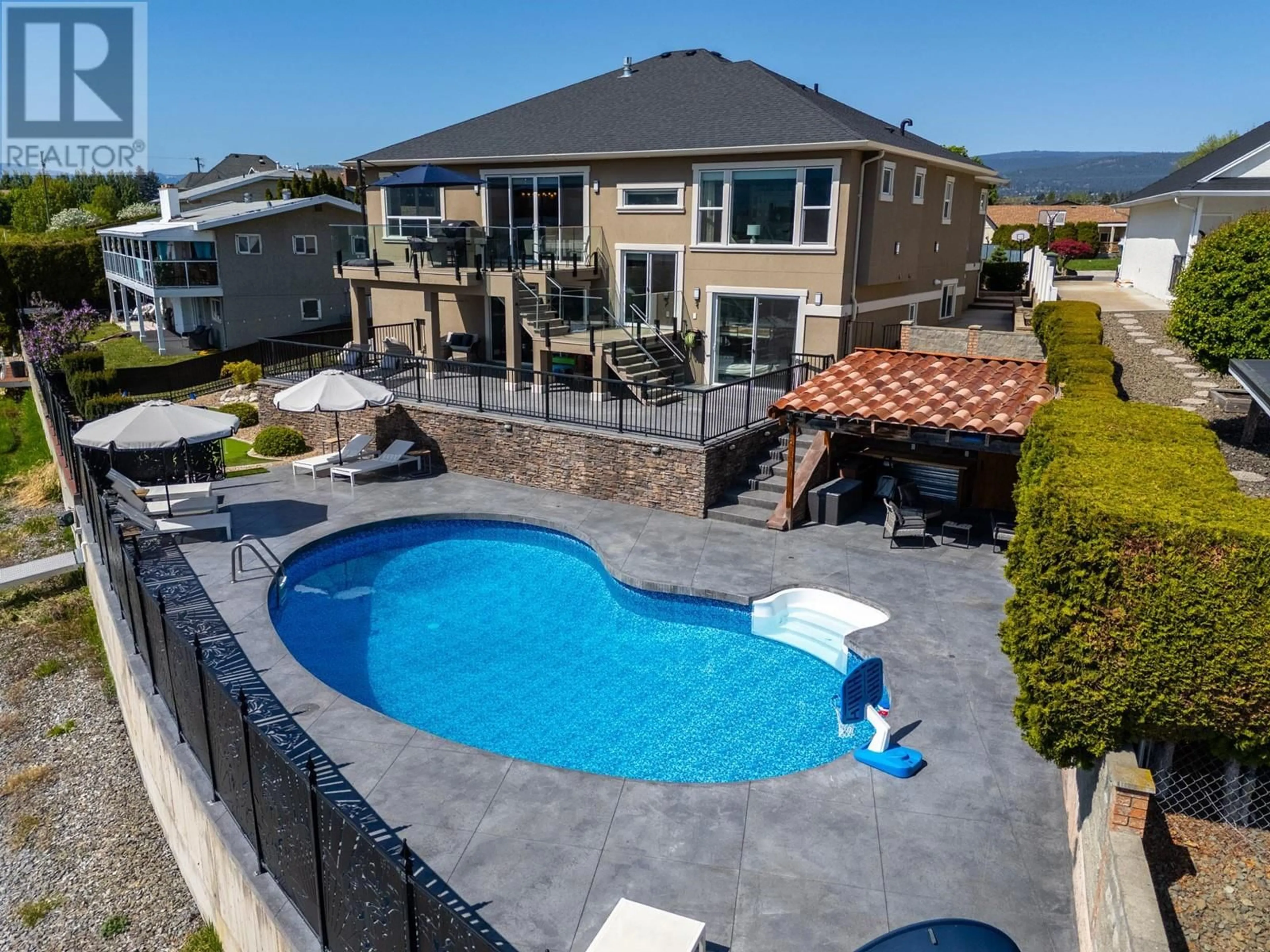 A pic from outside/outdoor area/front of a property/back of a property/a pic from drone, water/lake/river/ocean view for 3965 MILFORD ROAD, West Kelowna British Columbia V4T1X2
