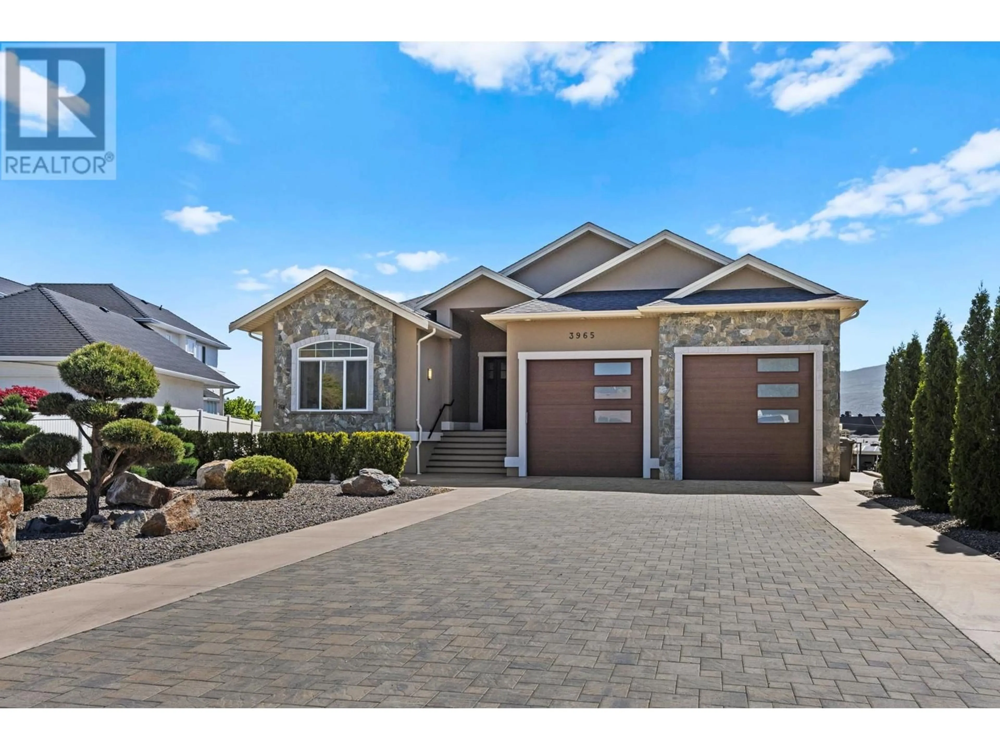 Home with vinyl exterior material, street for 3965 MILFORD ROAD, West Kelowna British Columbia V4T1X2