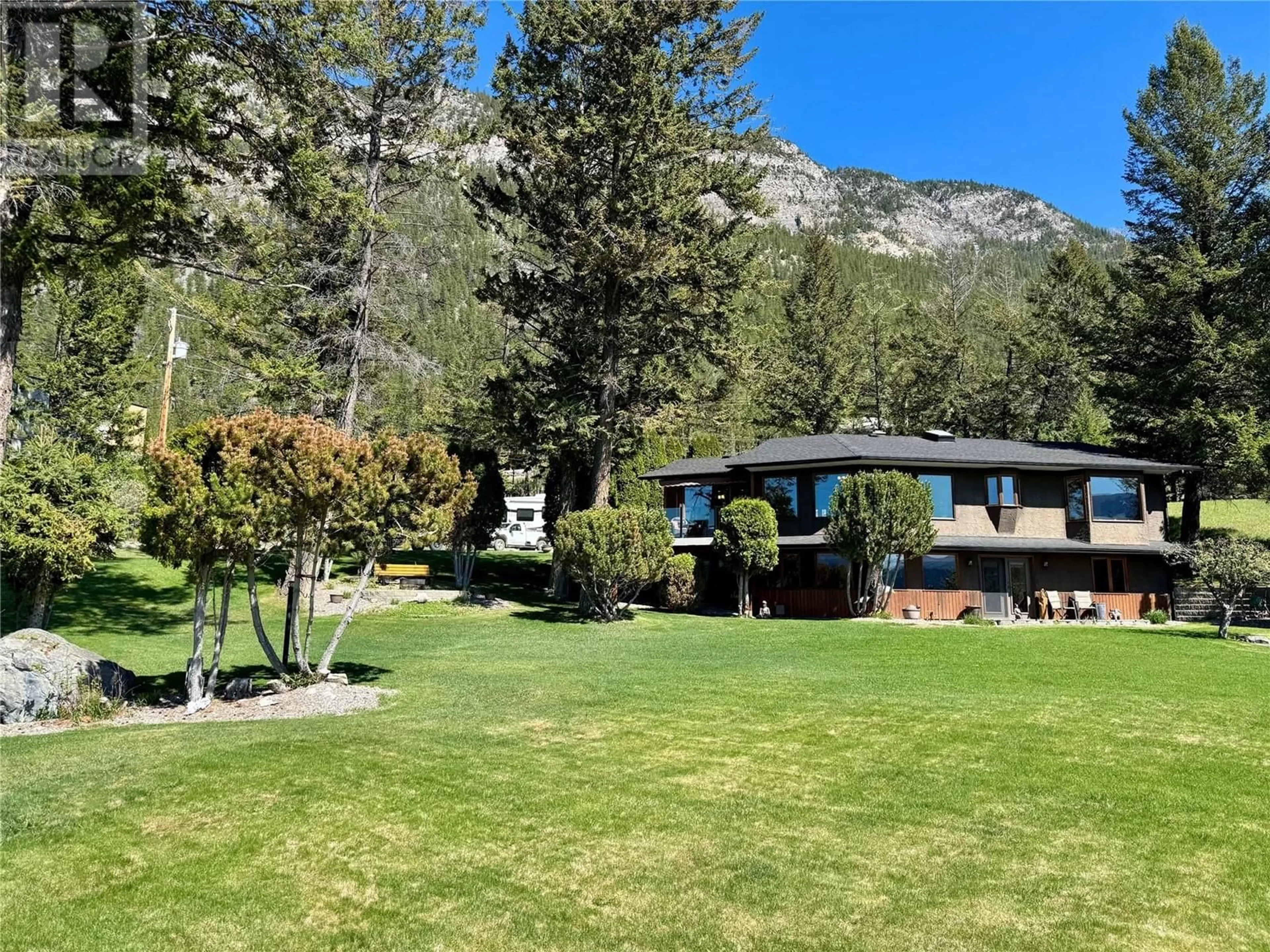 A pic from outside/outdoor area/front of a property/back of a property/a pic from drone, mountain view for 8380 RICHARDSON CRESCENT, Canal Flats British Columbia V0B1B0