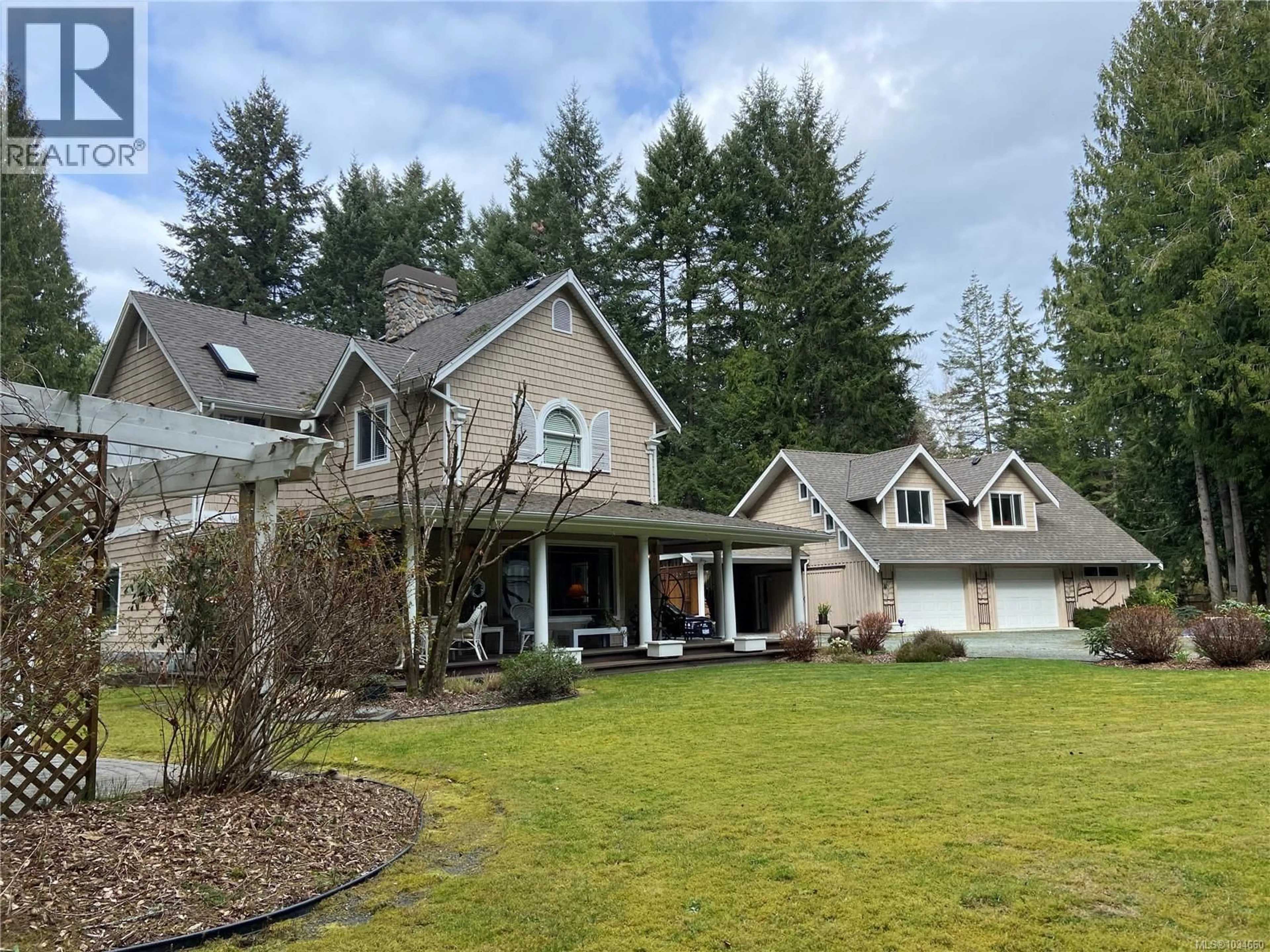 A pic from outside/outdoor area/front of a property/back of a property/a pic from drone, mountain view for 1753 PEERLESS ROAD, Shawnigan Lake British Columbia V0R1L0
