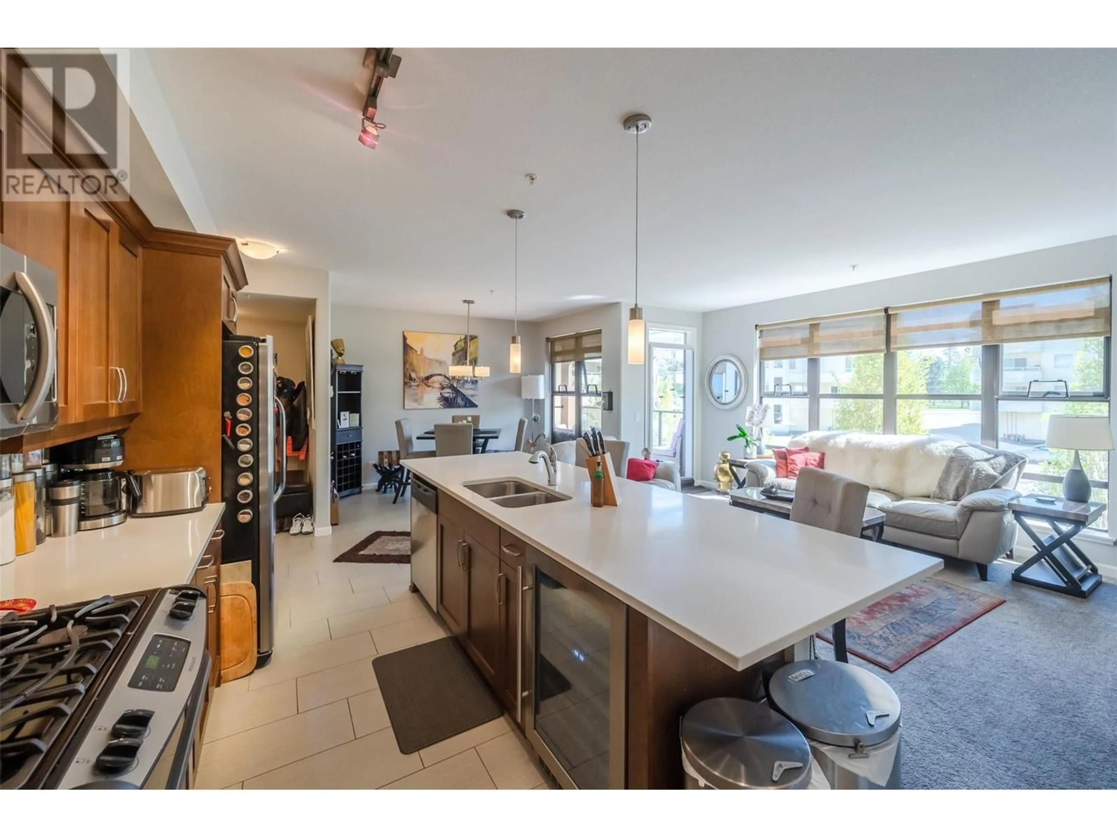 Open concept kitchen, ceramic/tile floor for 204 - 3591 SKAHA LAKE ROAD, Penticton British Columbia V2A7K2
