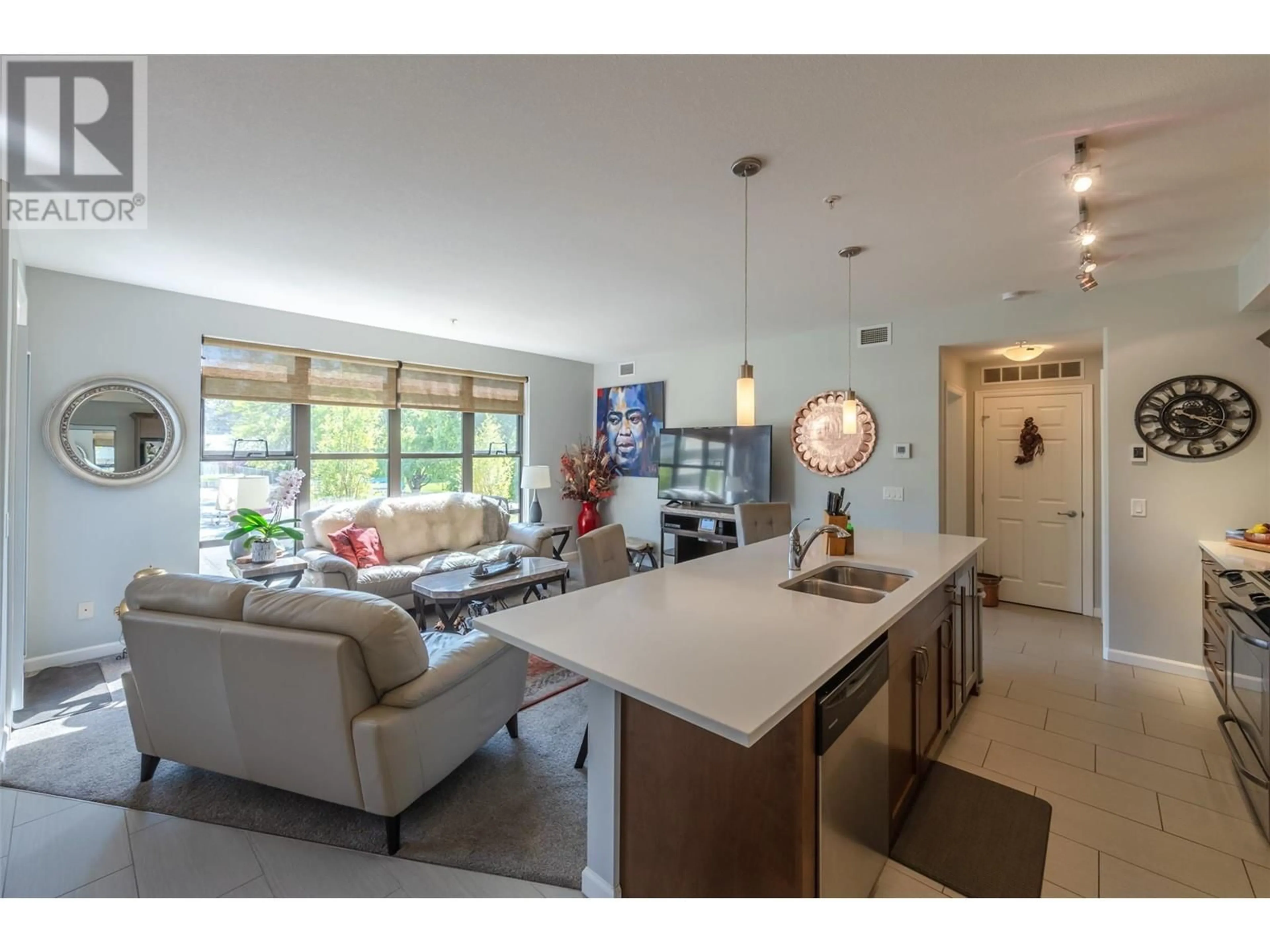 Open concept kitchen, ceramic/tile floor for 204 - 3591 SKAHA LAKE ROAD, Penticton British Columbia V2A7K2