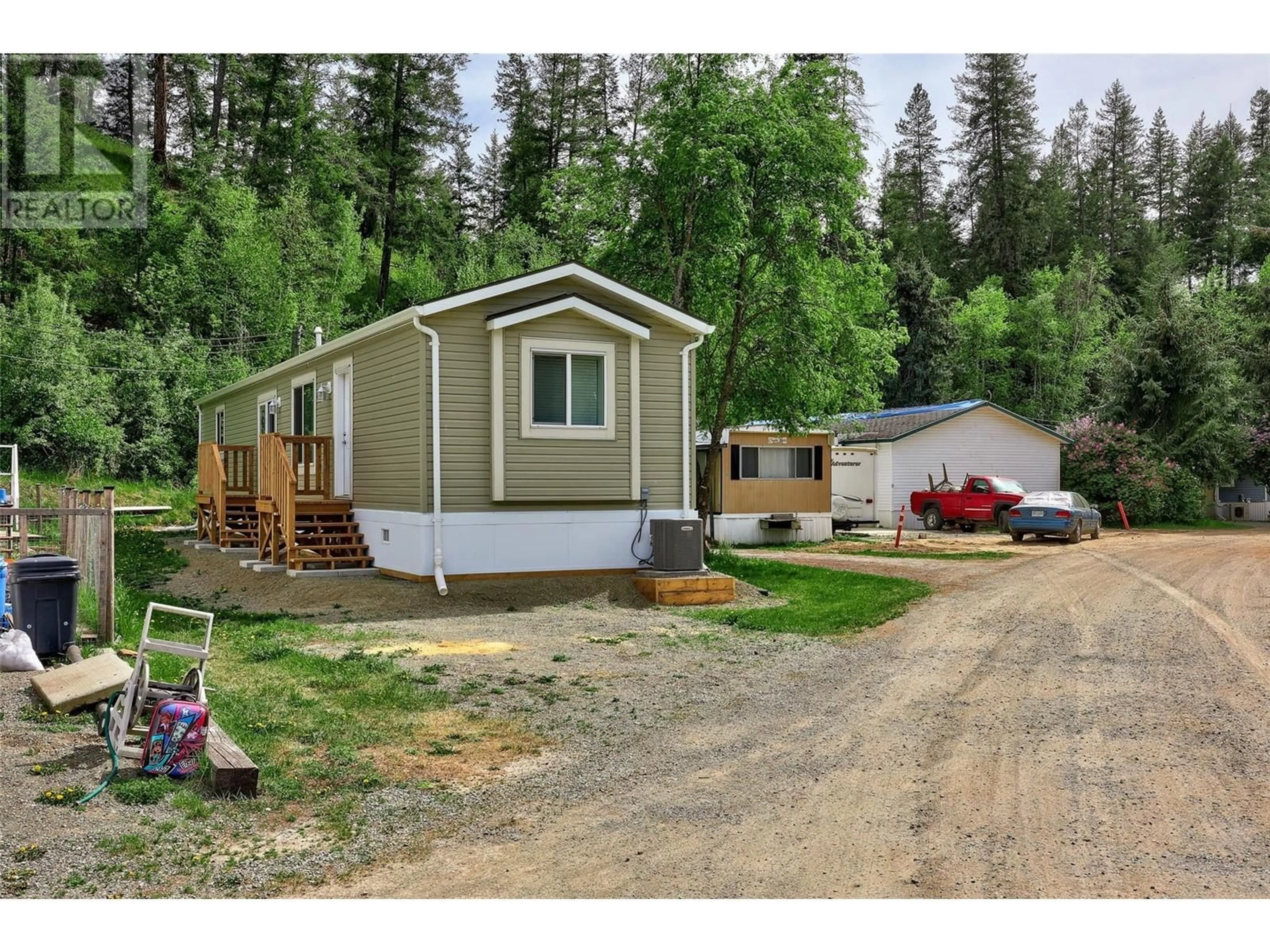 Home with vinyl exterior material, unknown for 11 - 4428 BARRIERE TOWN ROAD, Barriere British Columbia V0E1E0