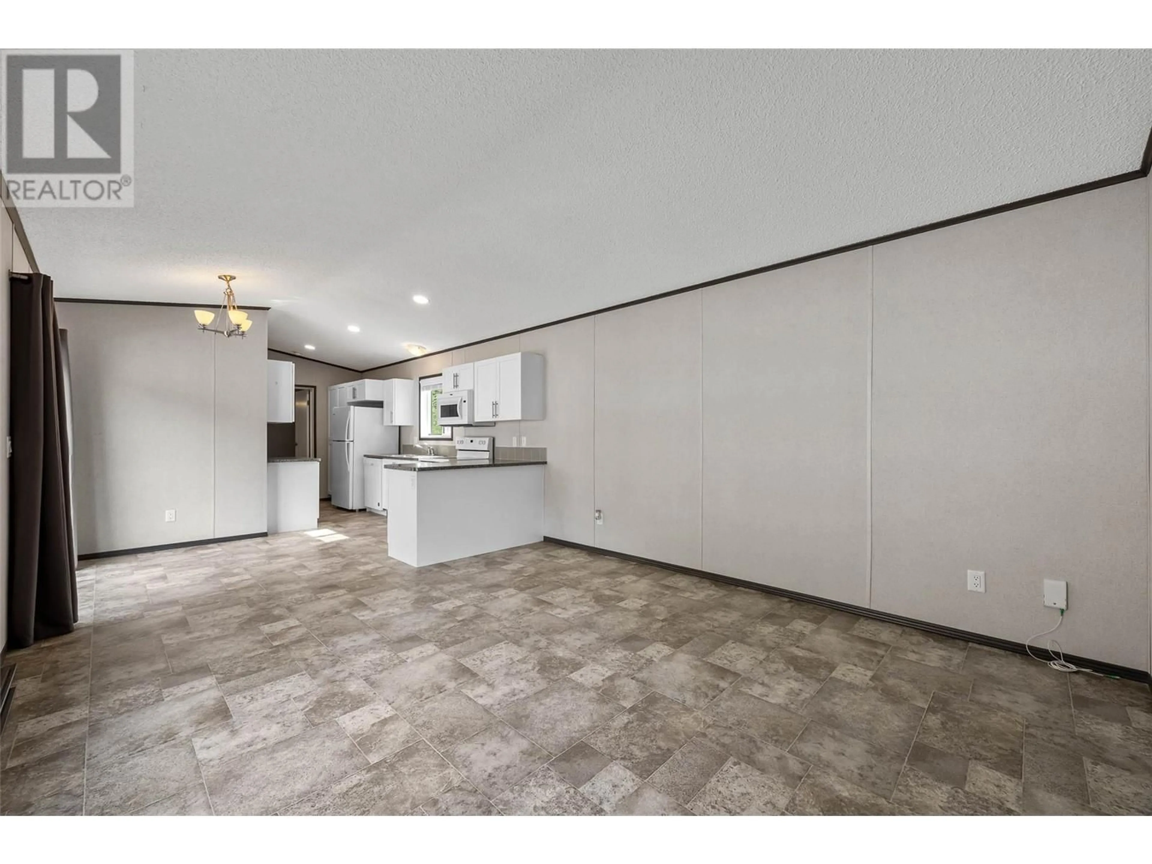 Open concept kitchen, ceramic/tile floor for 11 - 4428 BARRIERE TOWN ROAD, Barriere British Columbia V0E1E0