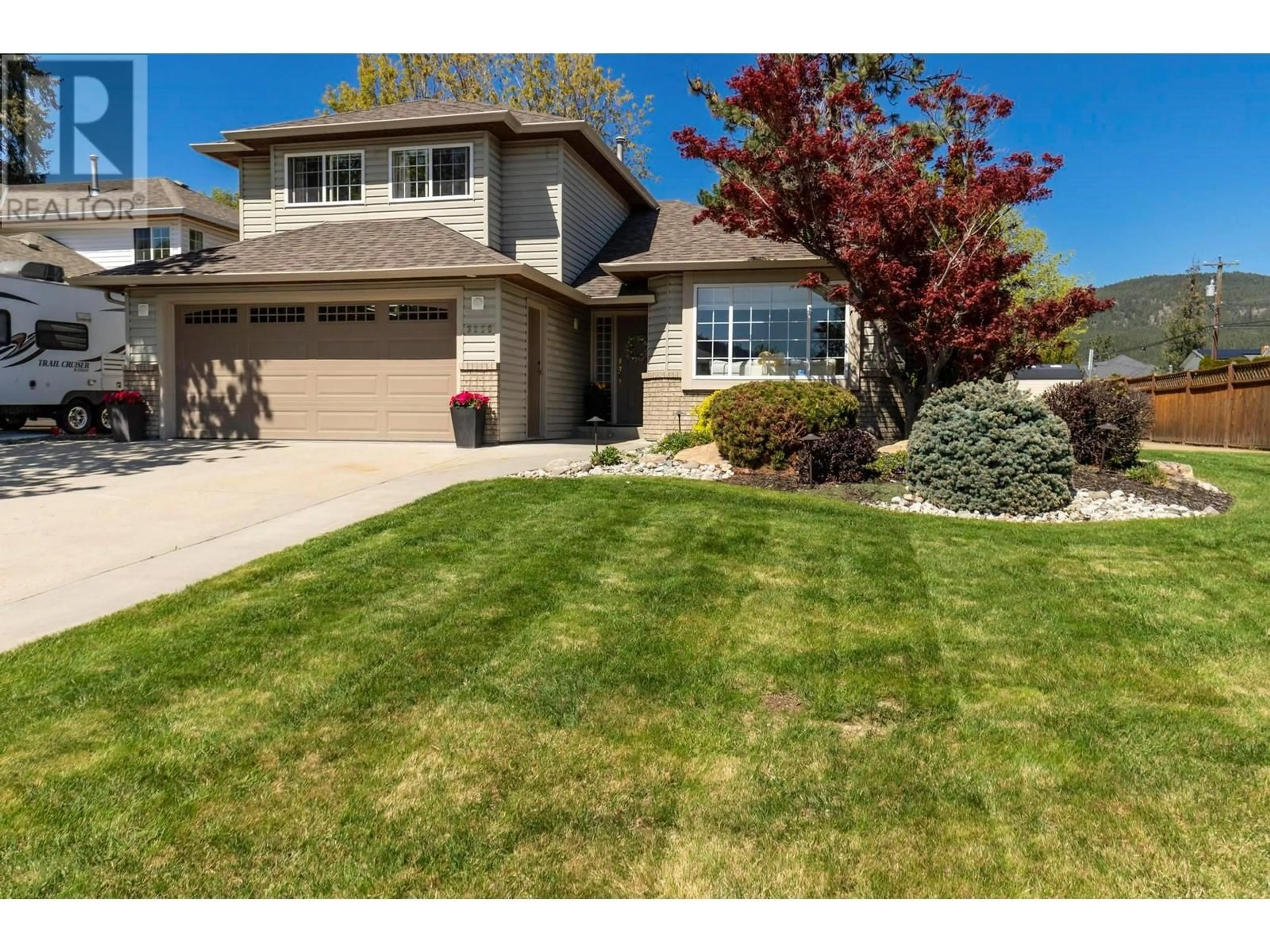 Home with vinyl exterior material, street for 3200 CORRAL COURT, West Kelowna British Columbia V4T1A7