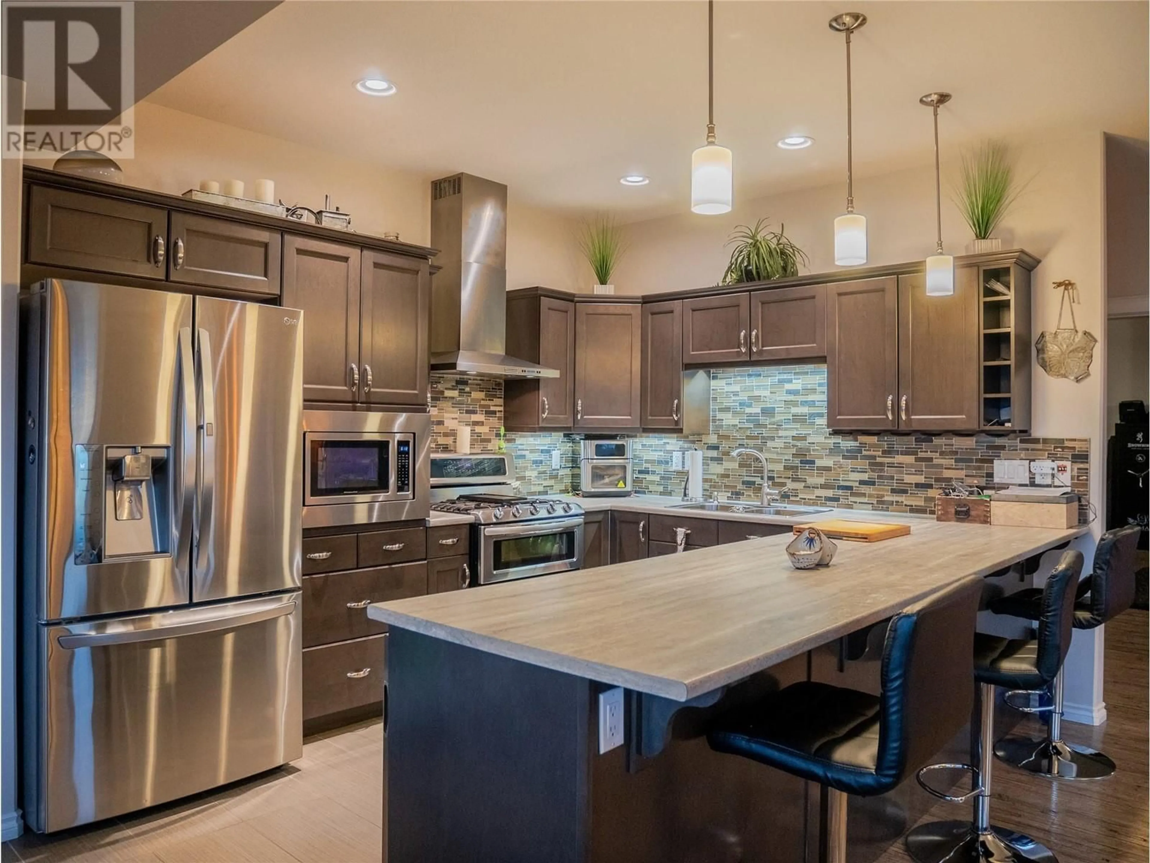 Contemporary kitchen, ceramic/tile floor for 805 89 AVENUE, Dawson Creek British Columbia V1G0A8