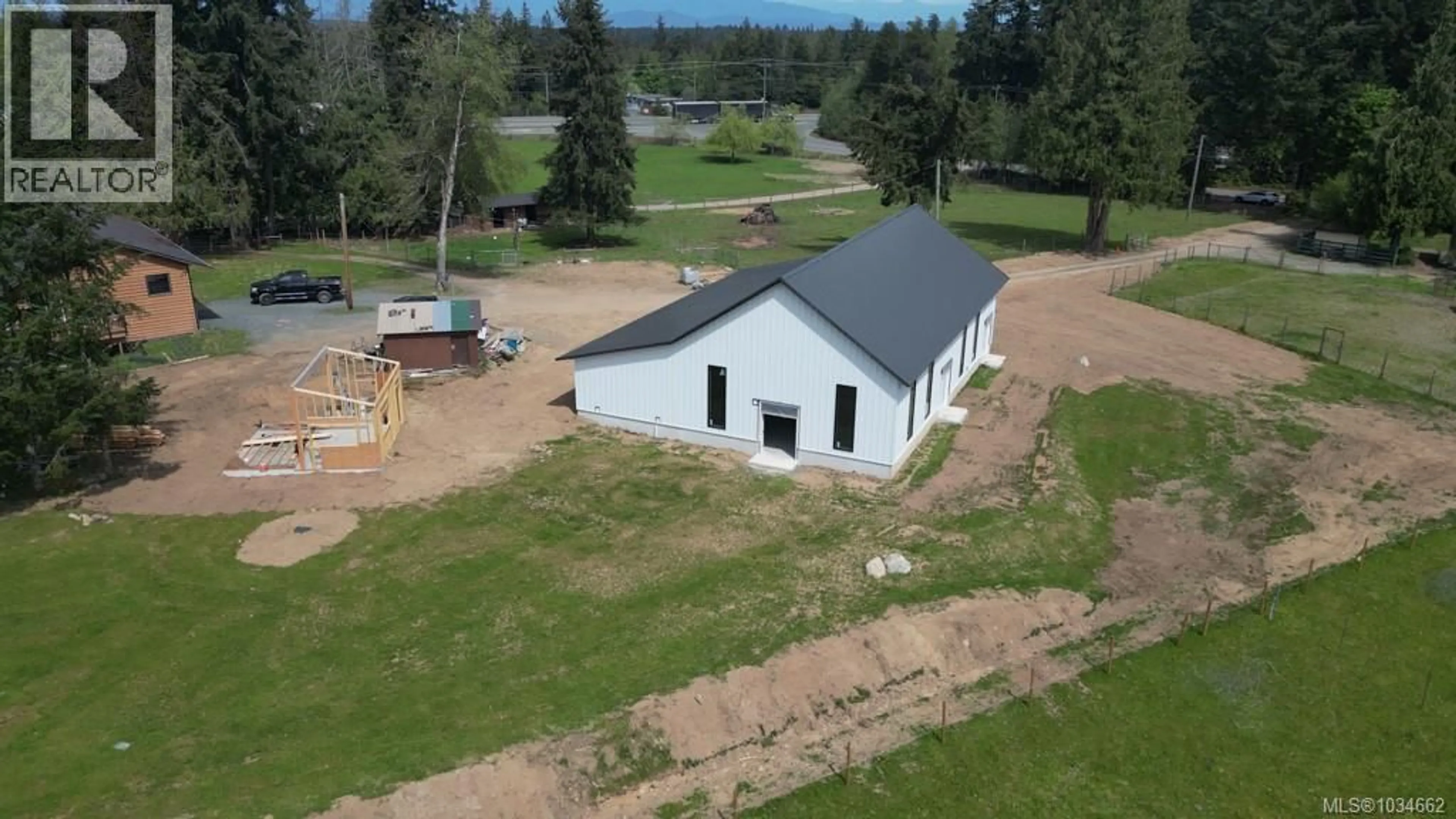 A pic from outside/outdoor area/front of a property/back of a property/a pic from drone, building for 981 PRATT ROAD, Qualicum Beach British Columbia V9K1W5