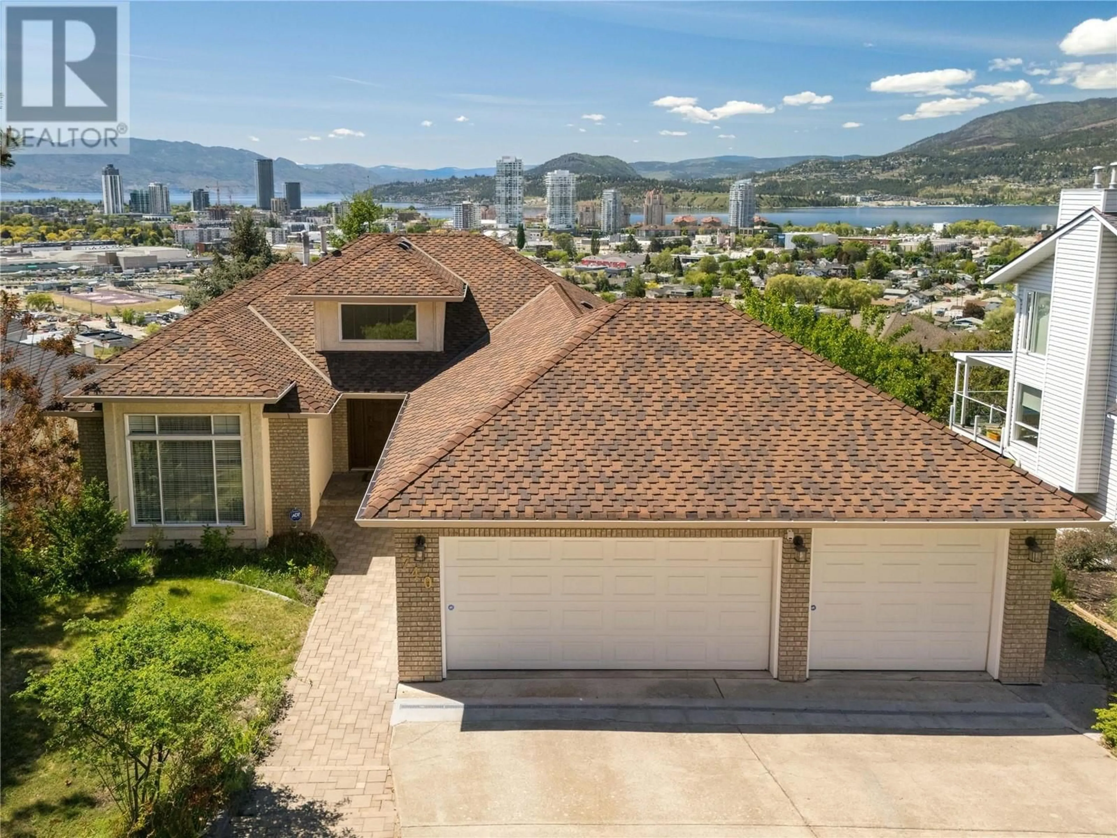 A pic from outside/outdoor area/front of a property/back of a property/a pic from drone, unknown for 740 ROYAL PINE DRIVE, Kelowna British Columbia V1Y9G2