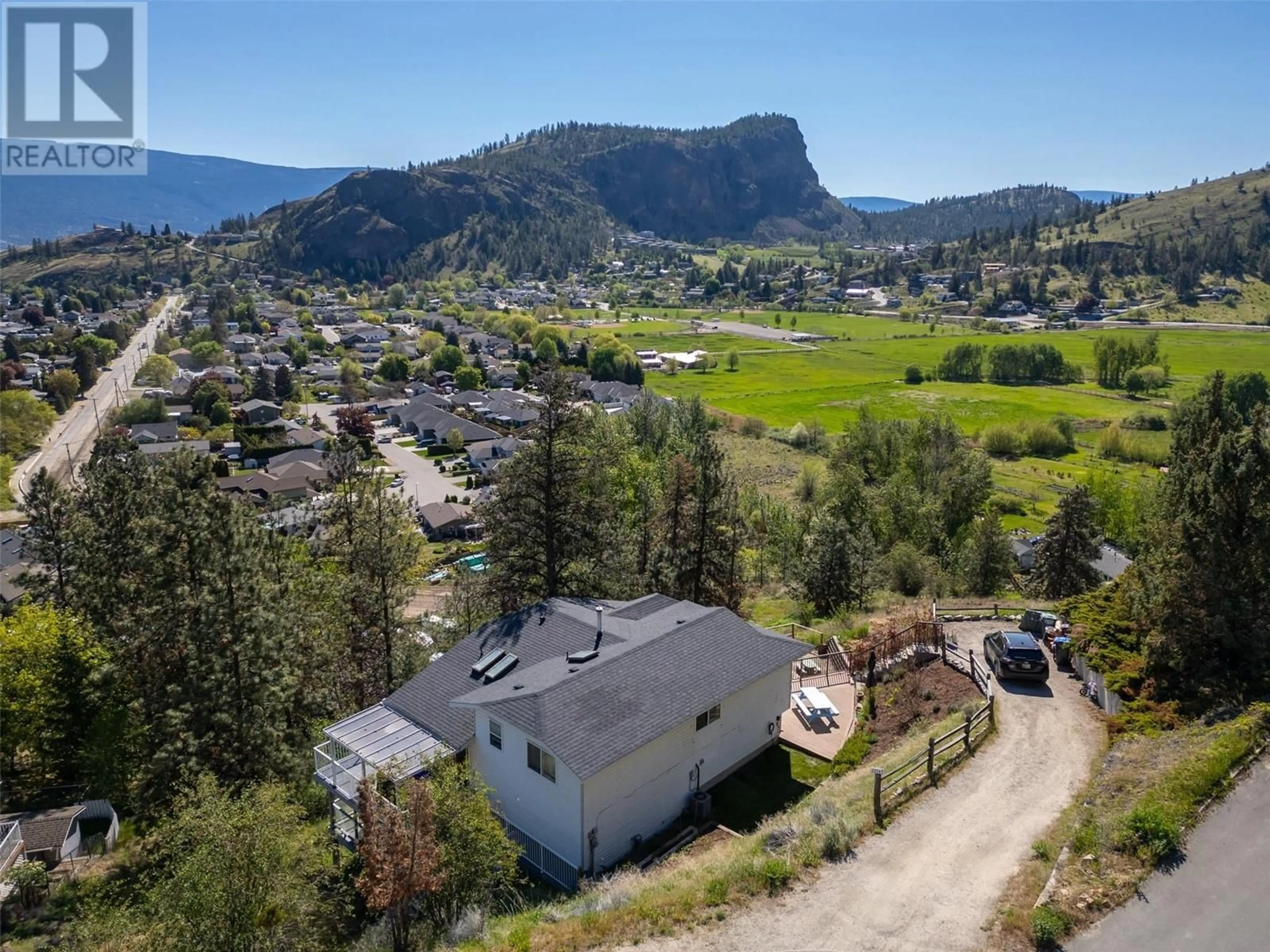 A pic from outside/outdoor area/front of a property/back of a property/a pic from drone, mountain view for 12563 TAYLOR PLACE, Summerland British Columbia V0H1Z8