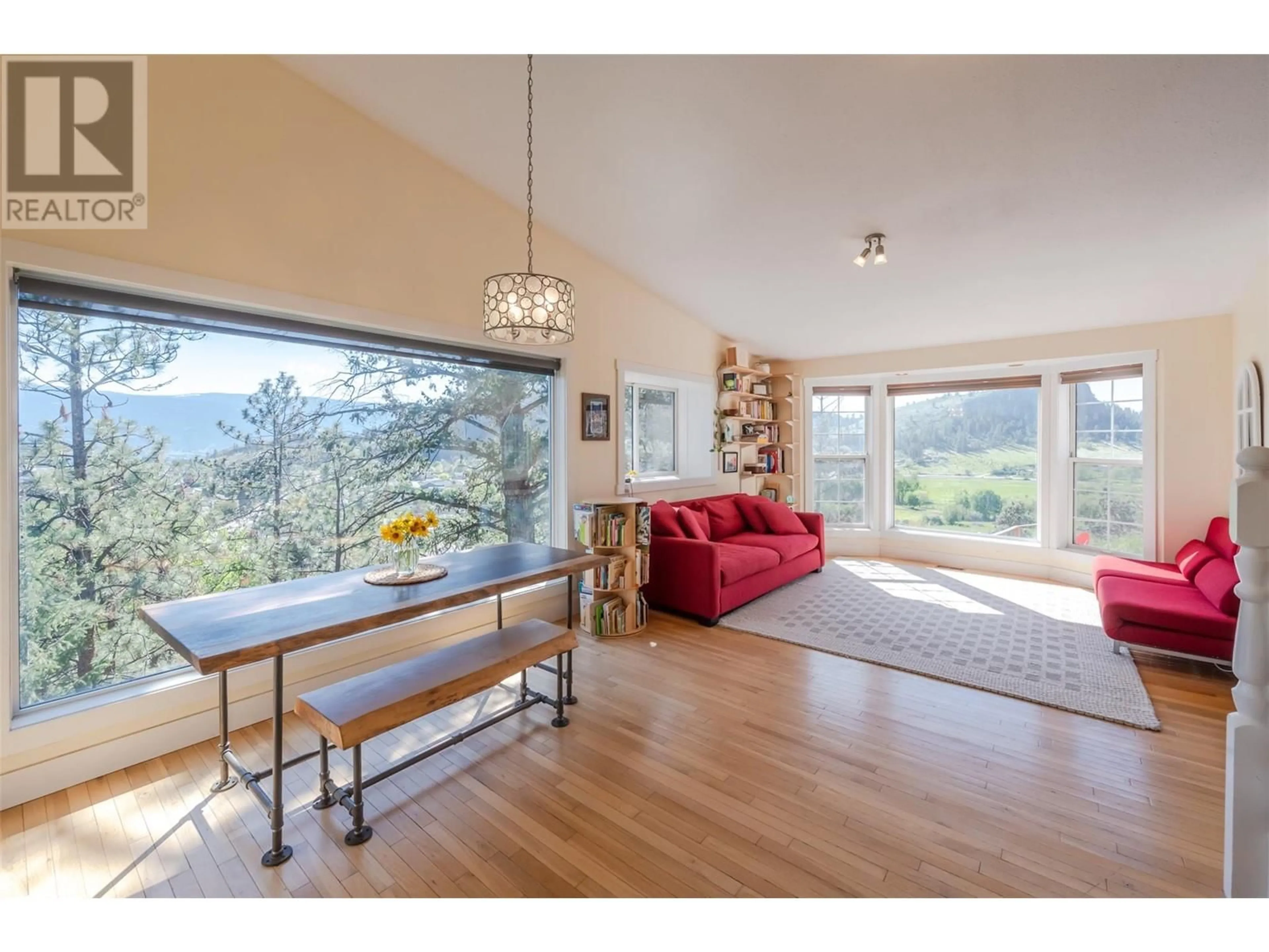 Living room with furniture, wood/laminate floor for 12563 TAYLOR PLACE, Summerland British Columbia V0H1Z8