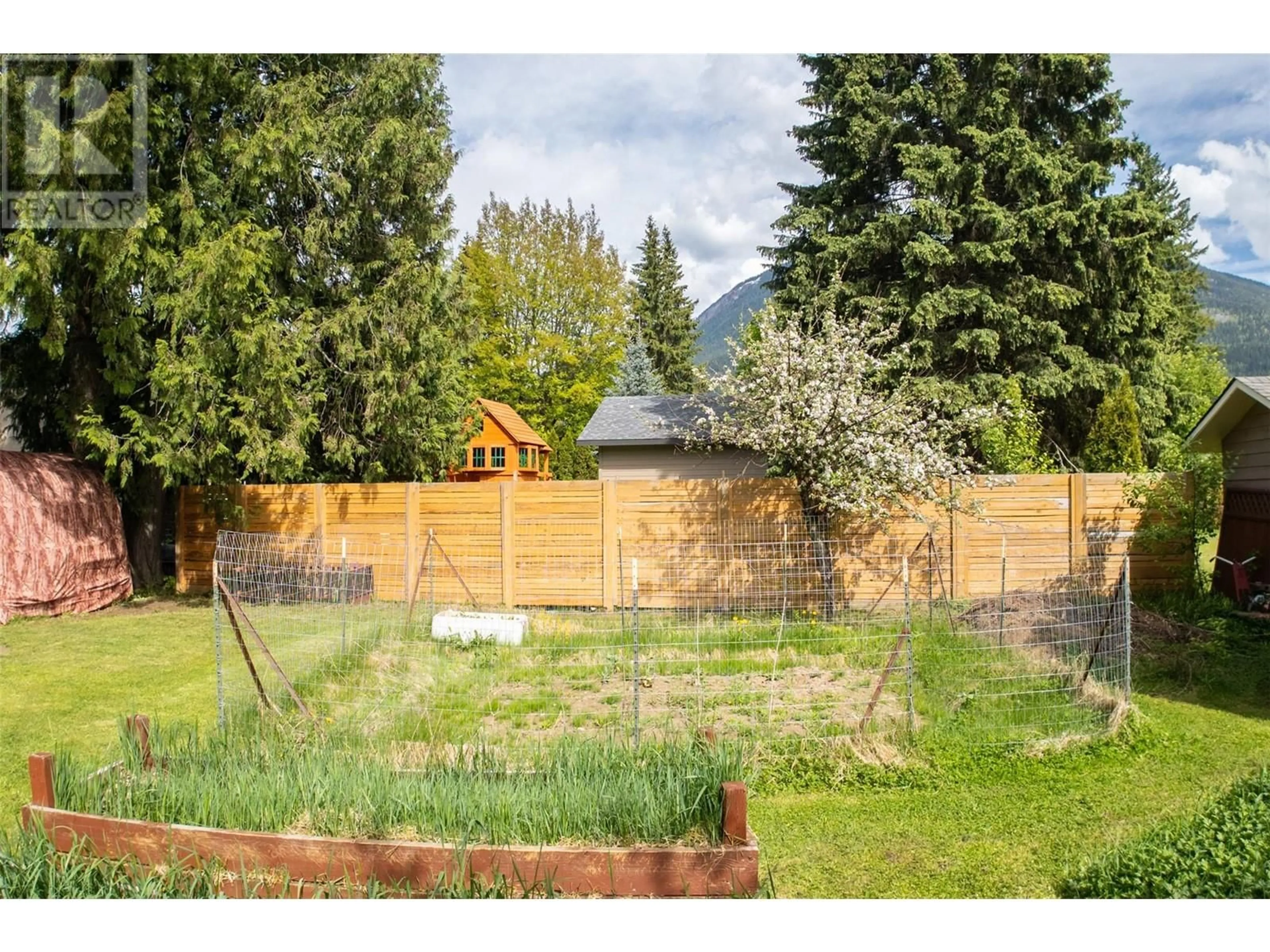 A pic from outside/outdoor area/front of a property/back of a property/a pic from drone, mountain view for 1329 PRATICO ROAD, Revelstoke British Columbia V0E2S1