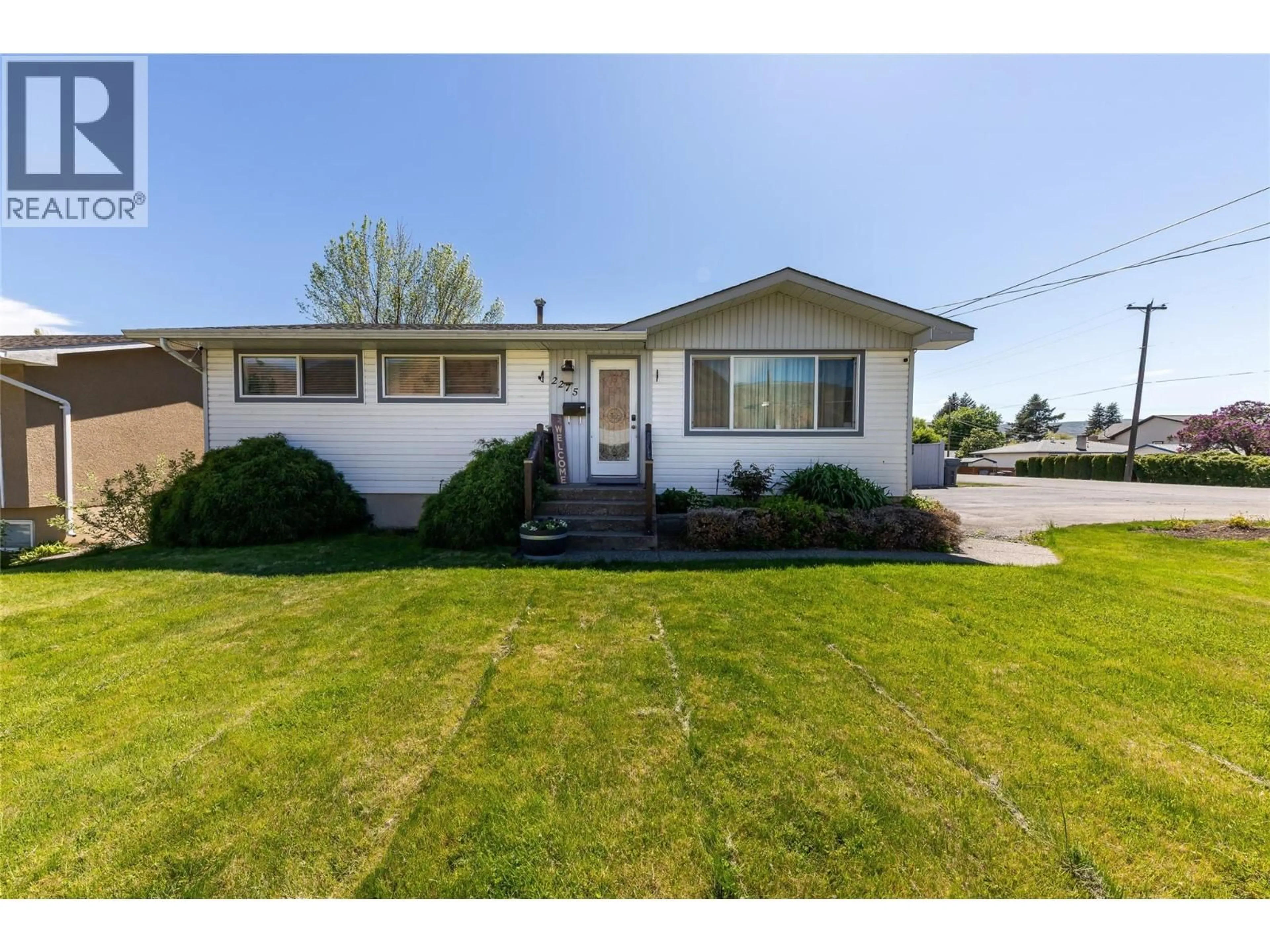 Home with vinyl exterior material, street for 2275 BONNIE PLACE, Kamloops British Columbia V2B4Y8