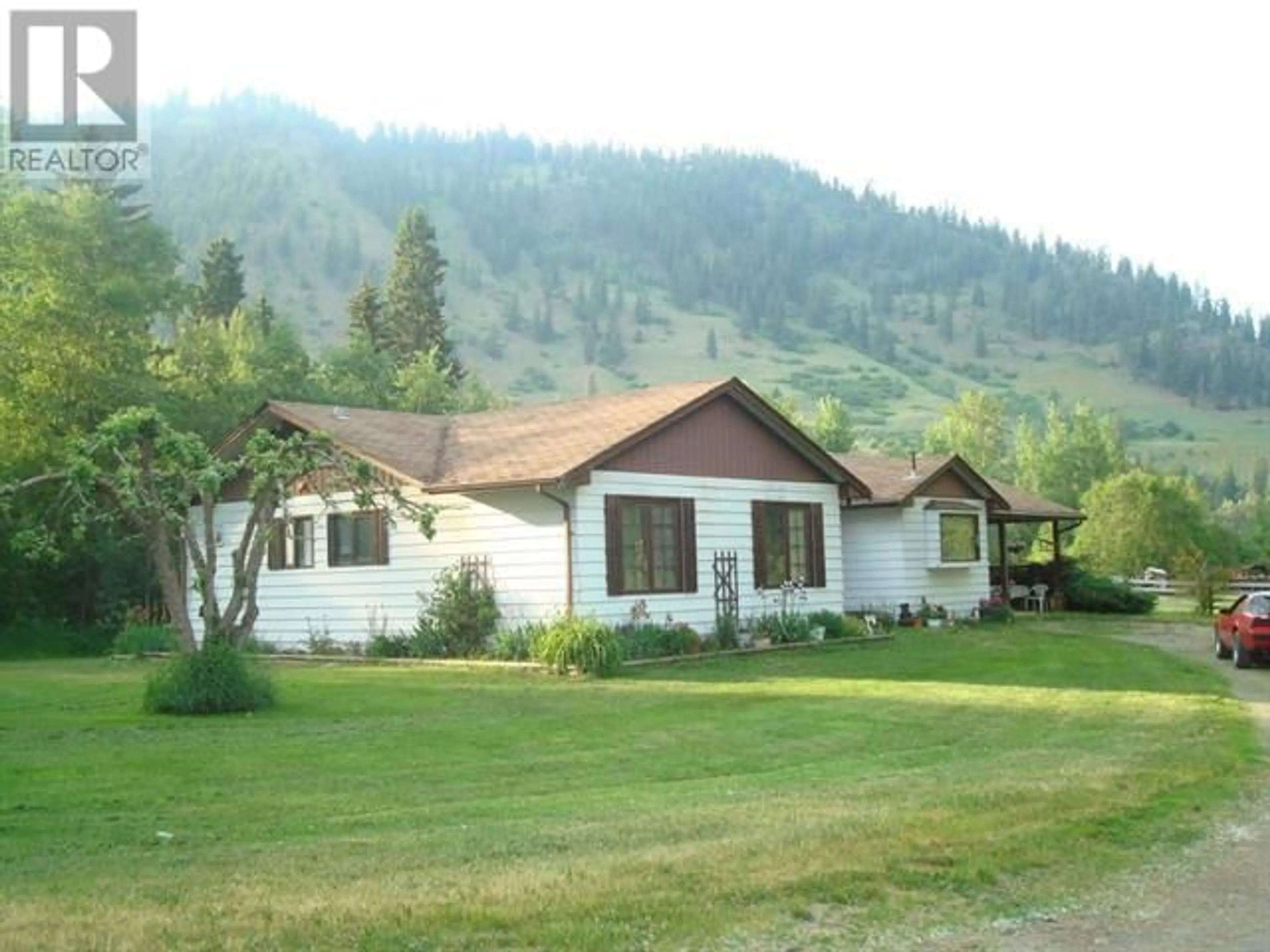 Home with vinyl exterior material, mountain view for 26 BARNES ROAD, Lumby British Columbia V0E2G7