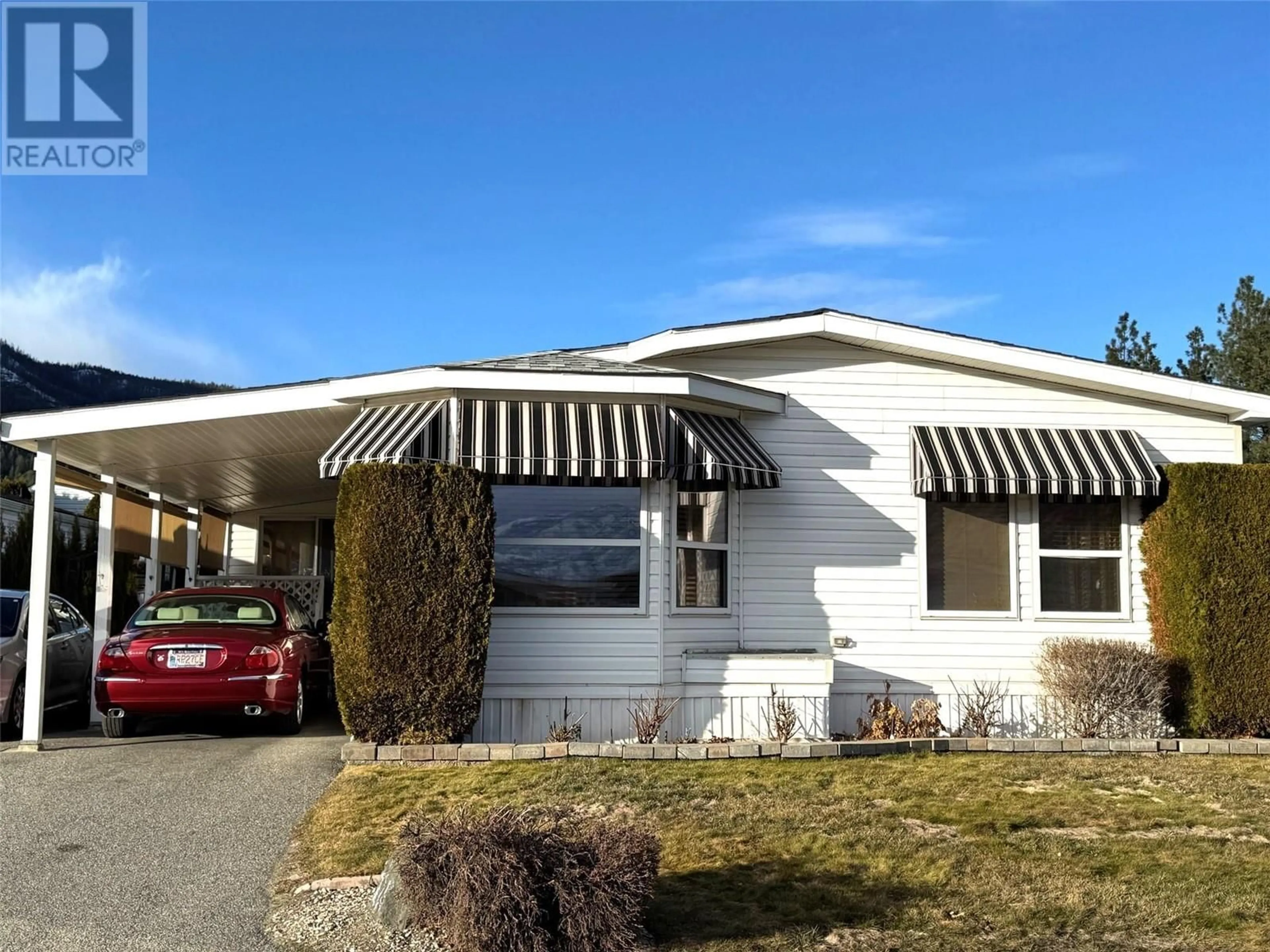 Home with vinyl exterior material, street for 128 - 1850 SHANNON LAKE ROAD, West Kelowna British Columbia V4T1L6