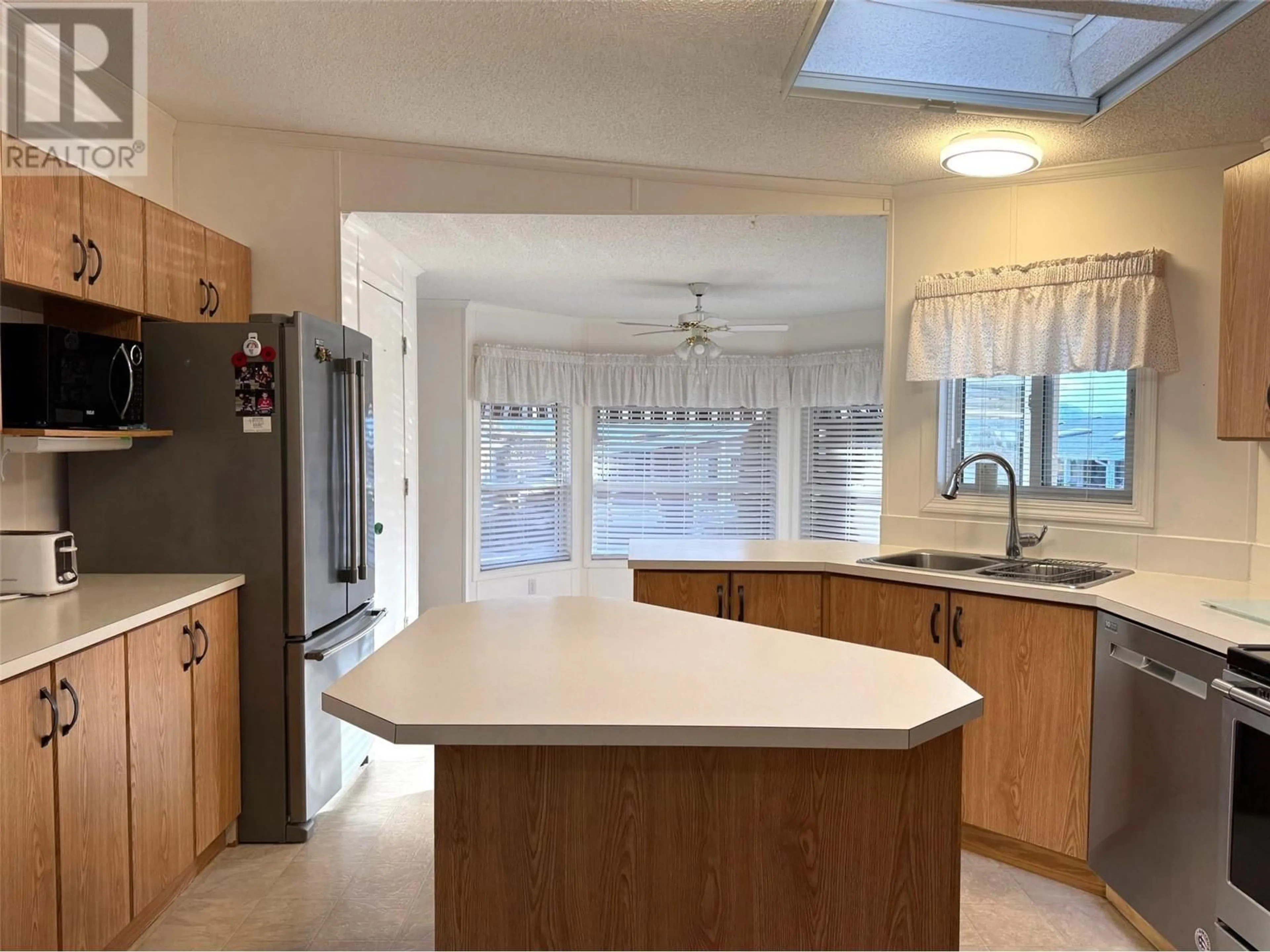 Open concept kitchen, ceramic/tile floor for 128 - 1850 SHANNON LAKE ROAD, West Kelowna British Columbia V4T1L6