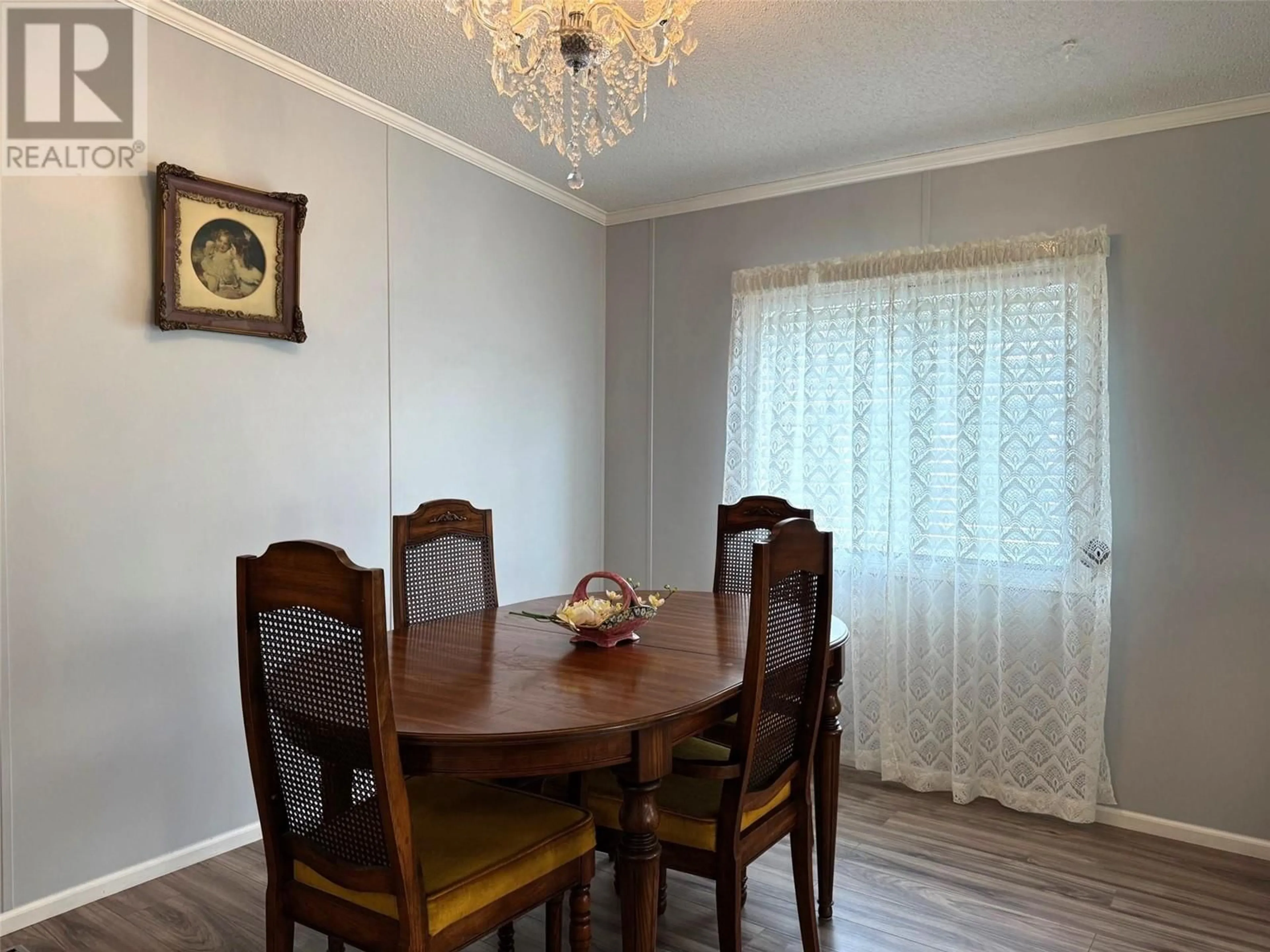 Dining room, wood/laminate floor for 128 - 1850 SHANNON LAKE ROAD, West Kelowna British Columbia V4T1L6