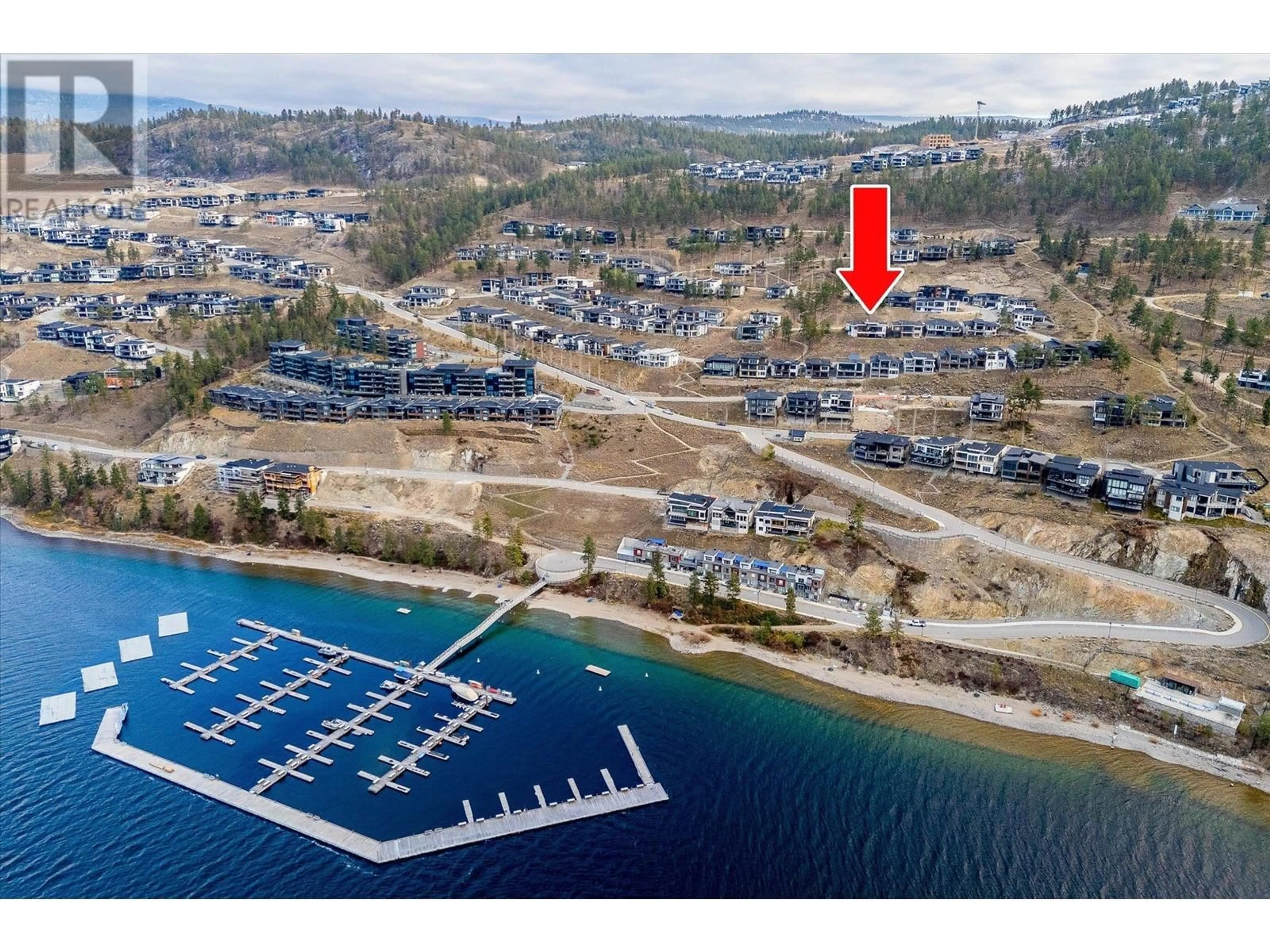 A pic from outside/outdoor area/front of a property/back of a property/a pic from drone, water/lake/river/ocean view for 3380 WATER BIRCH CIRCLE, Kelowna British Columbia V1V3G1