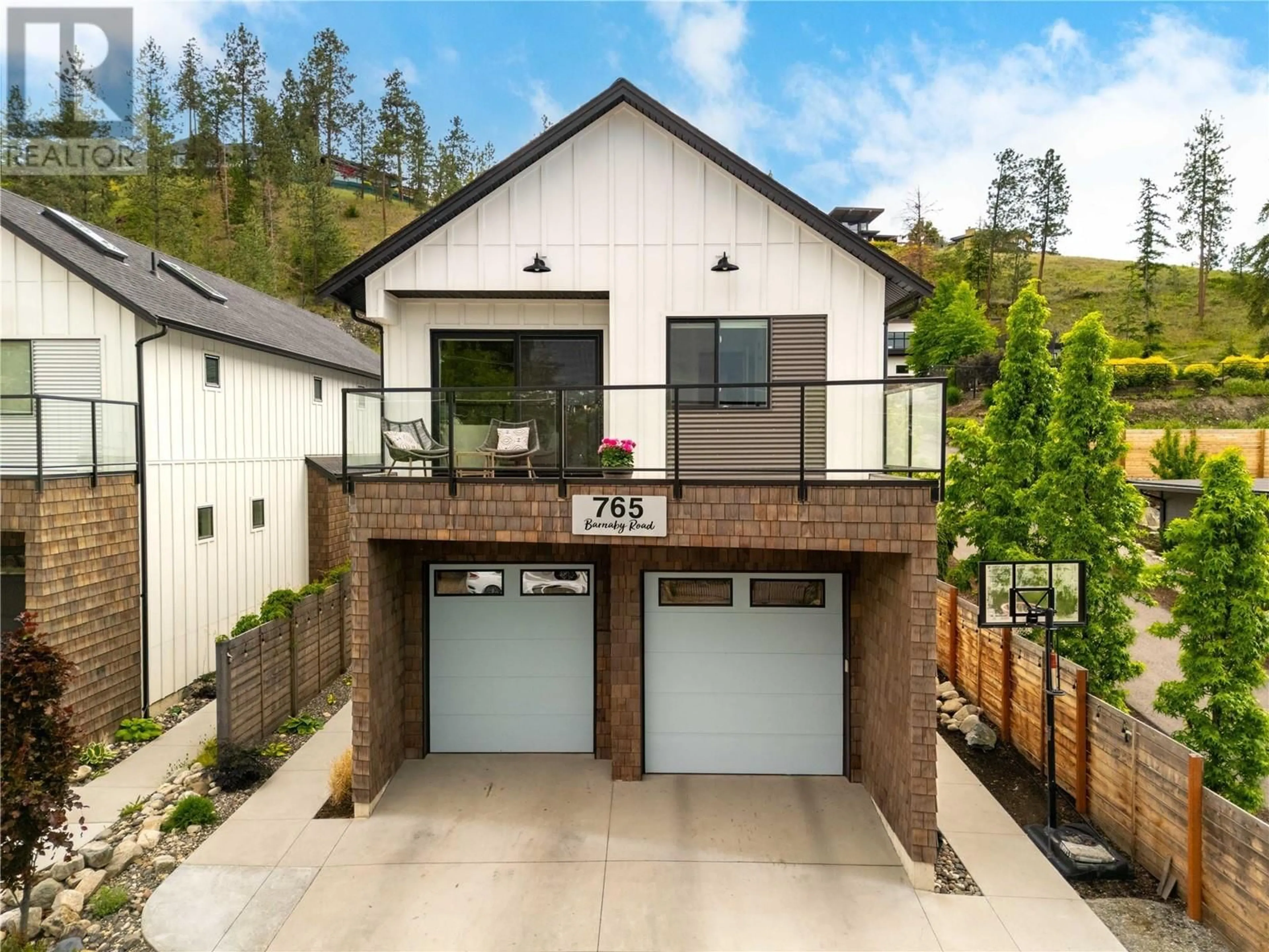Home with brick exterior material, unknown for 765 BARNABY ROAD, Kelowna British Columbia V1W4N9