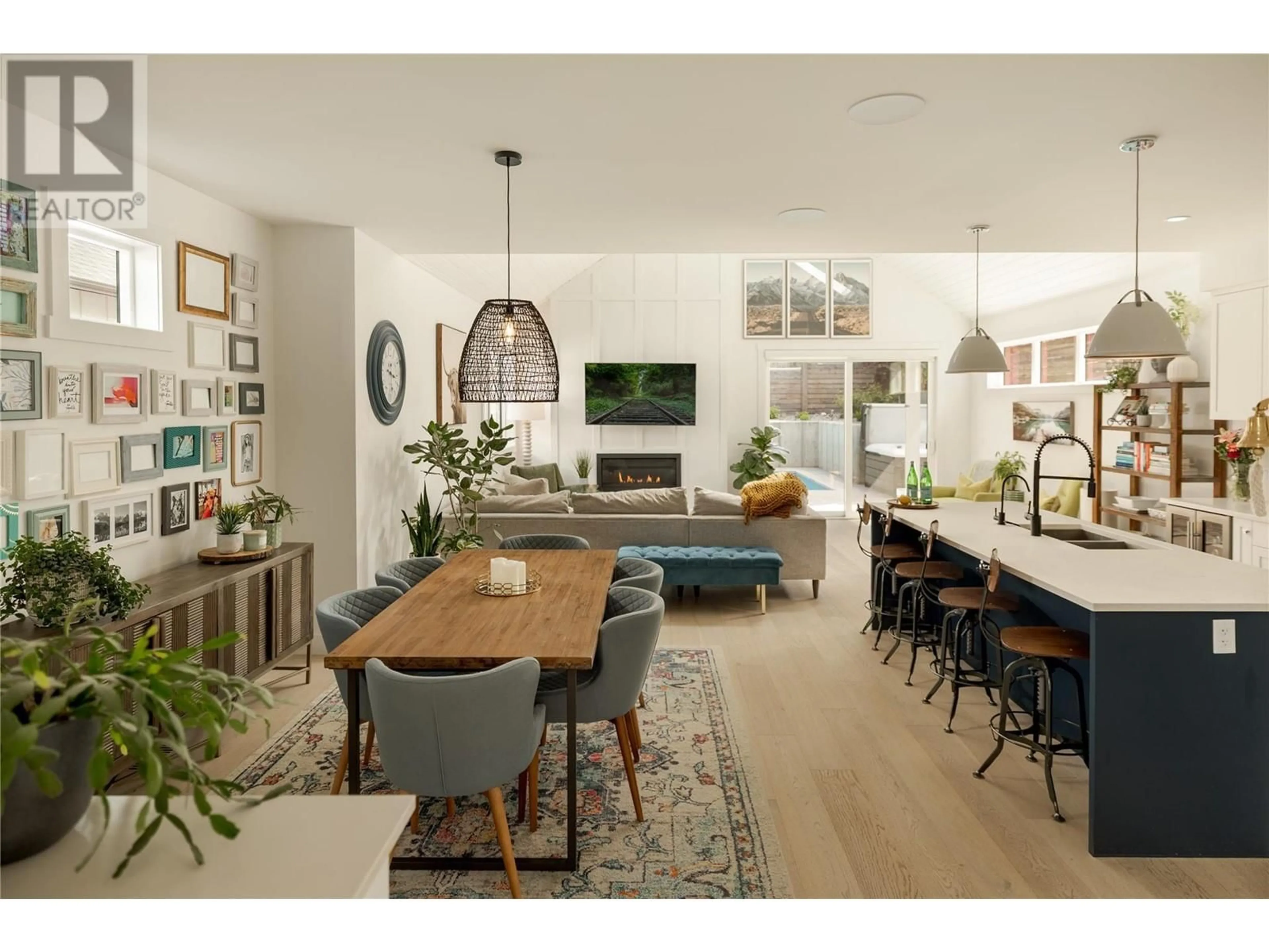 Open concept kitchen, wood/laminate floor for 765 BARNABY ROAD, Kelowna British Columbia V1W4N9