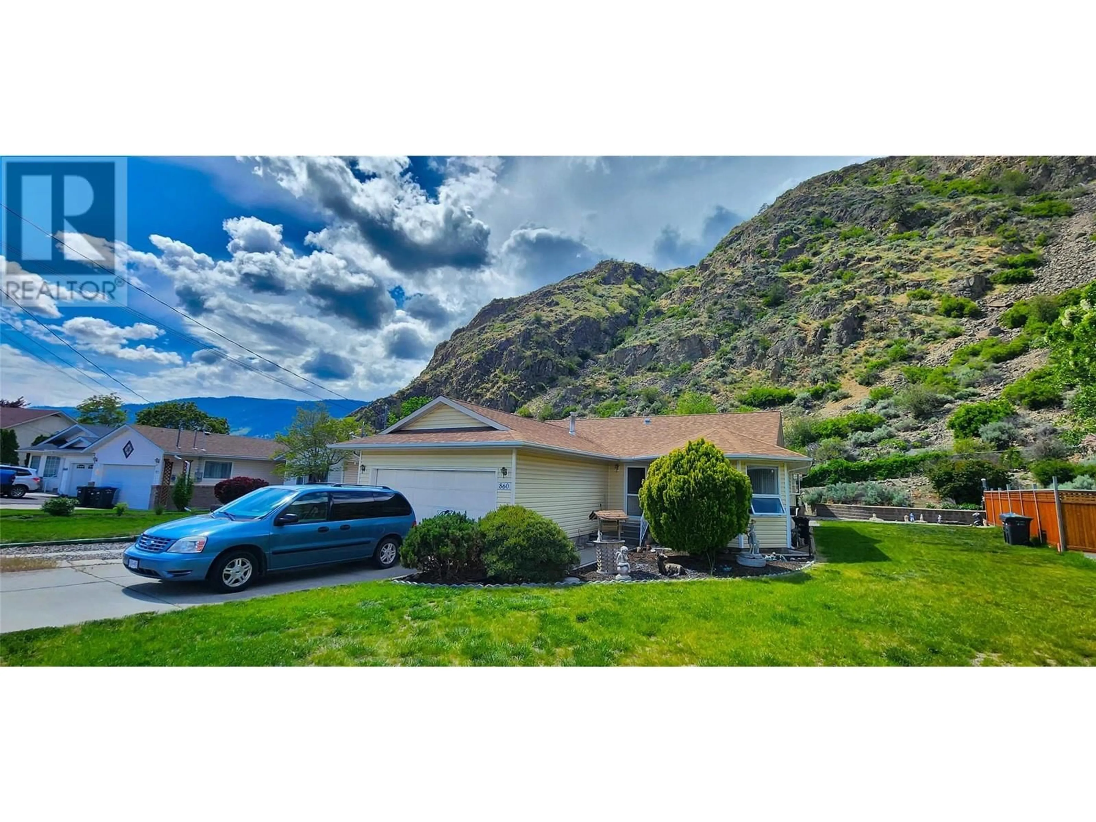 A pic from outside/outdoor area/front of a property/back of a property/a pic from drone, mountain view for 860 EVENINGSTAR CRESCENT, Oliver British Columbia V0H1T0
