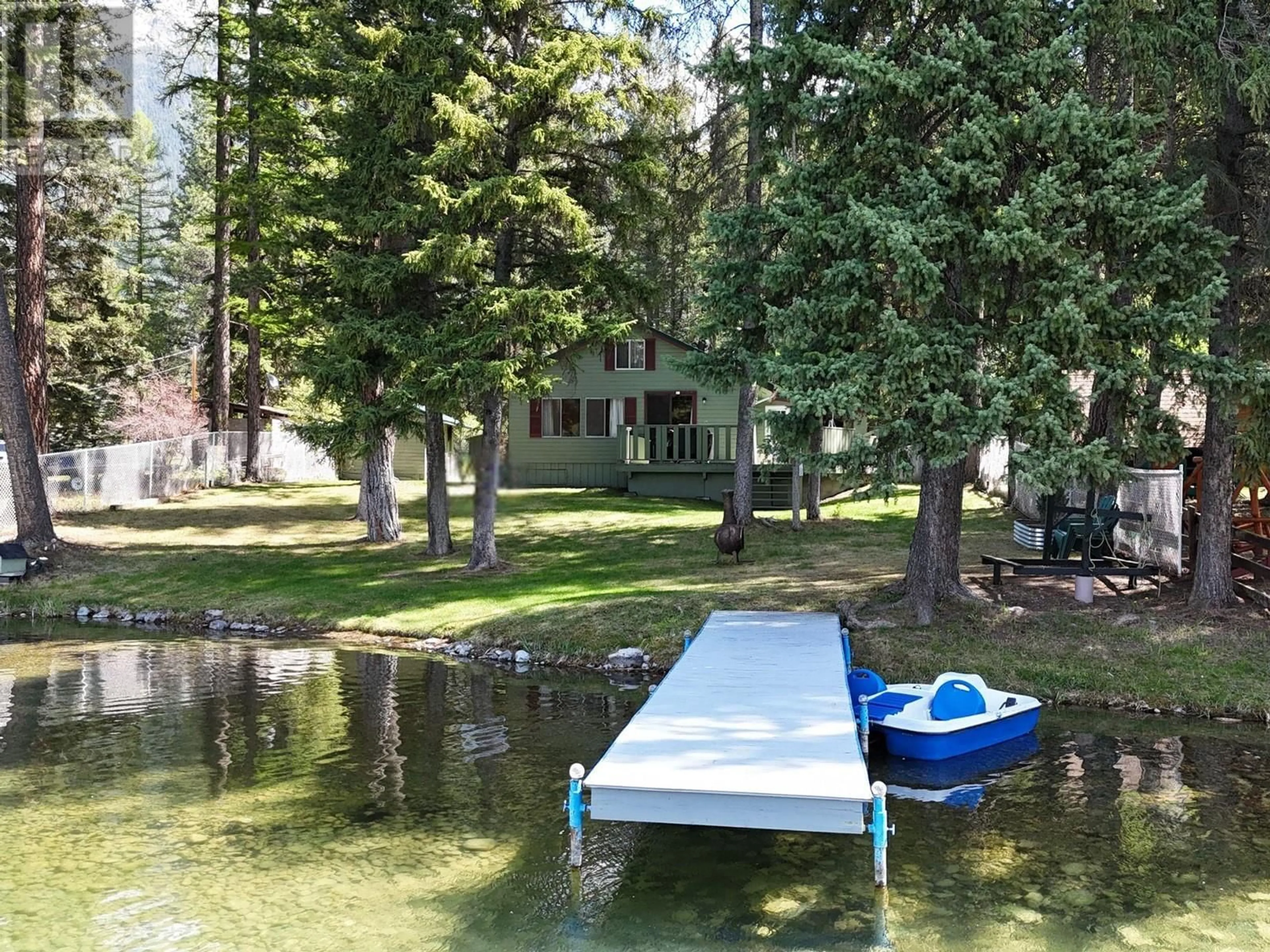A pic from outside/outdoor area/front of a property/back of a property/a pic from drone, water/lake/river/ocean view for 2401 GARBUTTS LAKE ROAD, Fort Steele British Columbia V0B2J0
